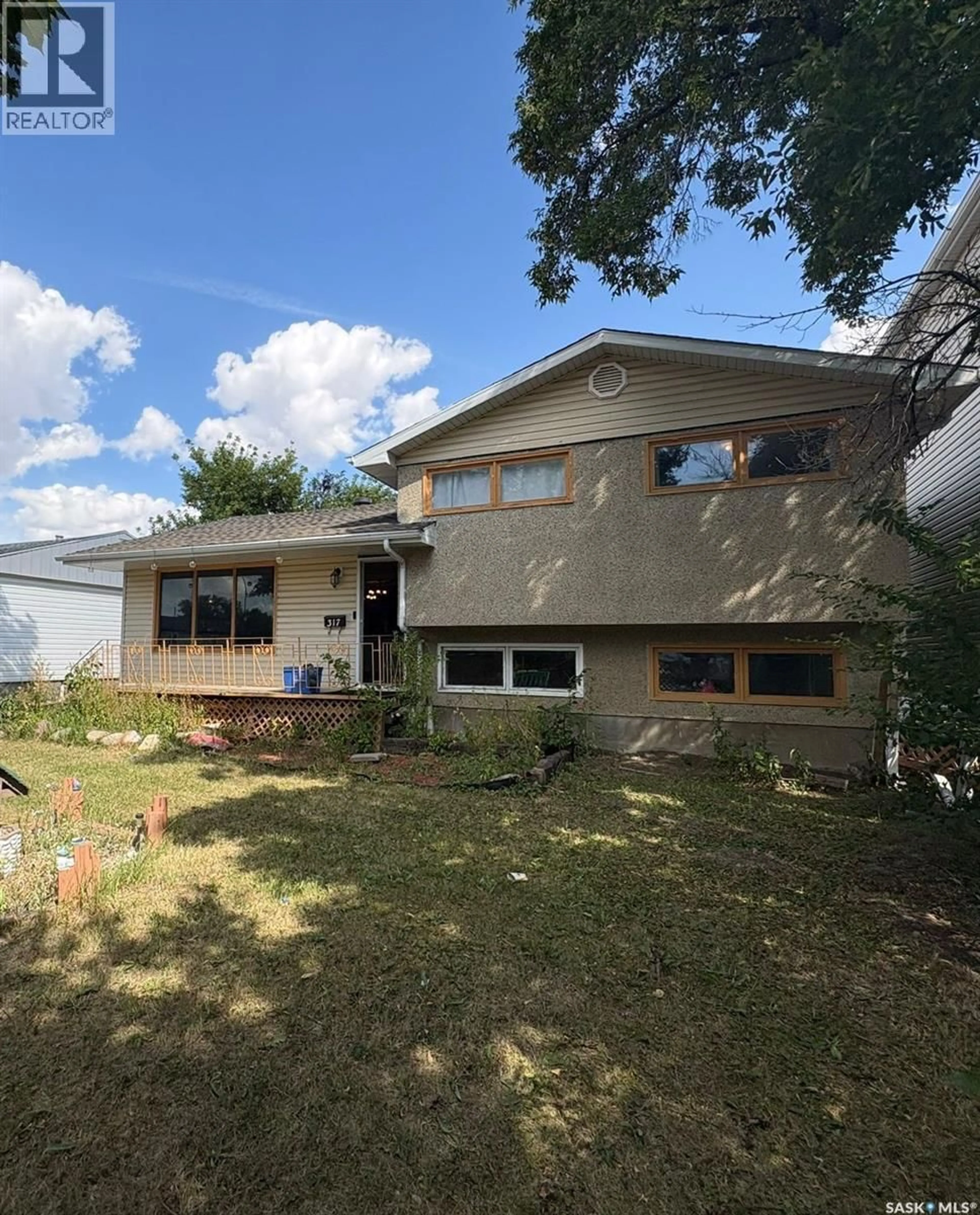 Home with vinyl exterior material, street for 317 HALIFAX STREET, Regina Saskatchewan S4R1T1