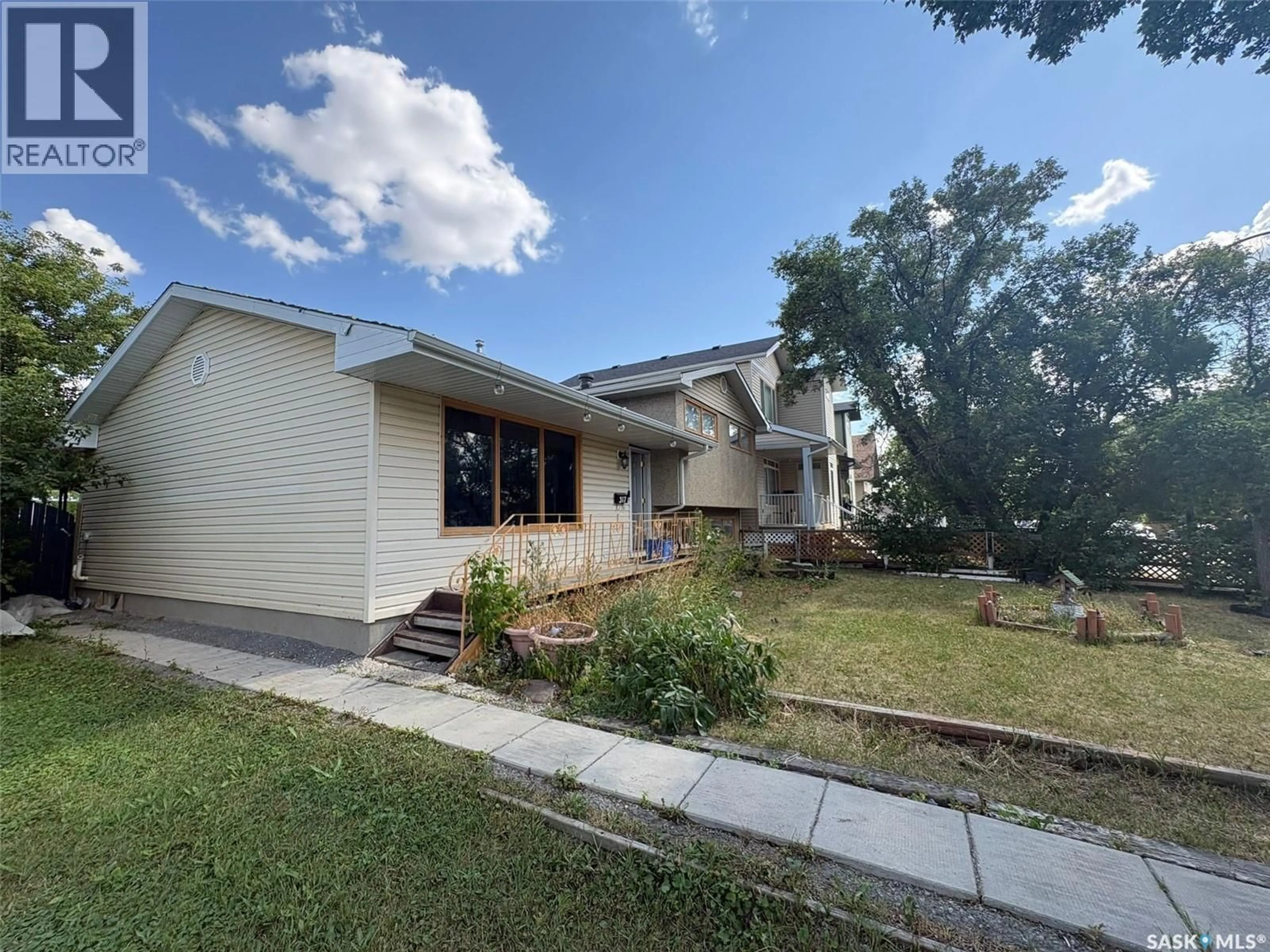 A pic from outside/outdoor area/front of a property/back of a property/a pic from drone, street for 317 HALIFAX STREET, Regina Saskatchewan S4R1T1