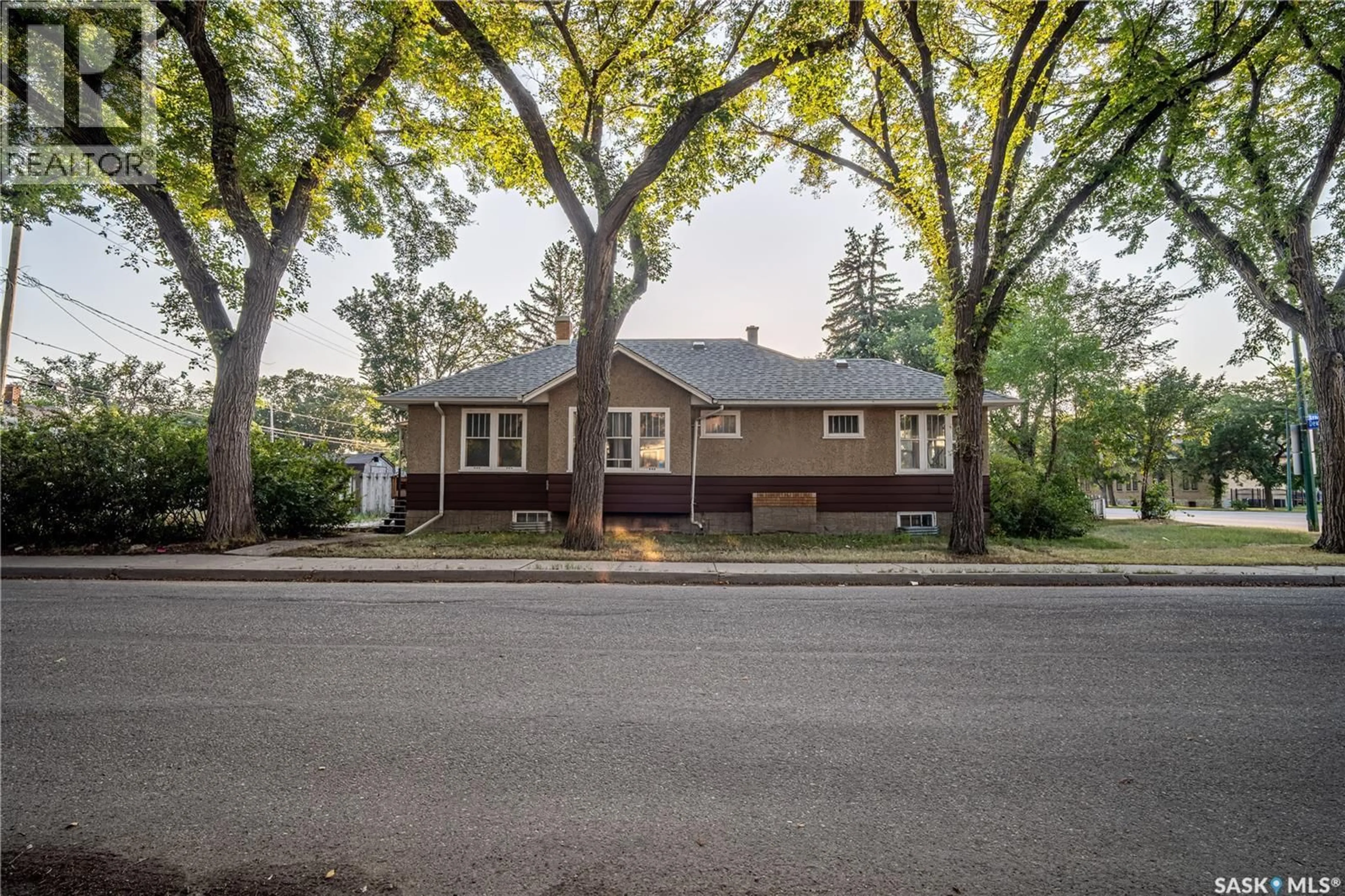 Home with vinyl exterior material, street for 3303 DEWDNEY AVENUE, Regina Saskatchewan S4T0Y9