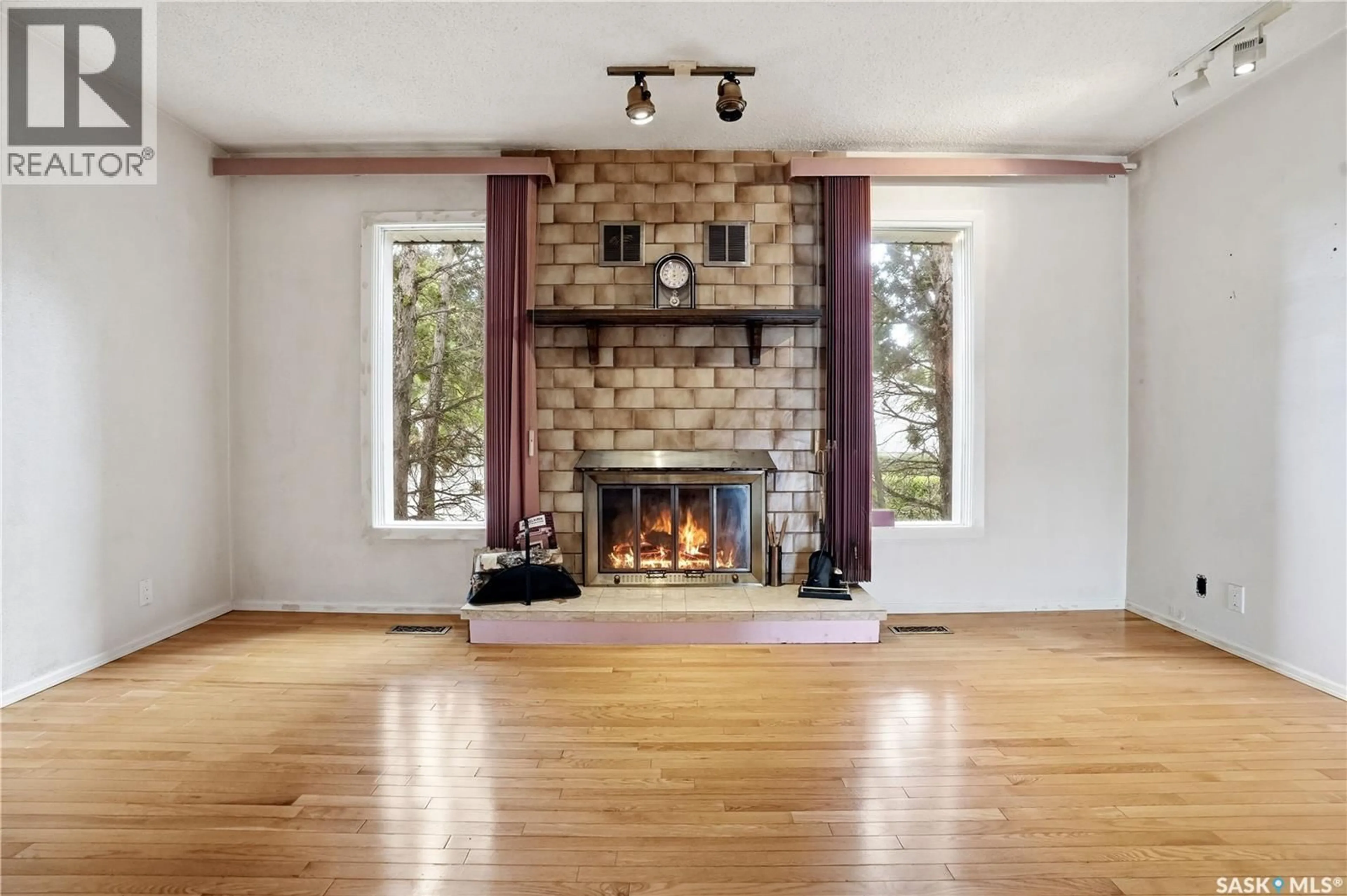 Living room with furniture, unknown for 83 FUHRMANN CRESCENT, Regina Saskatchewan S4R5S4
