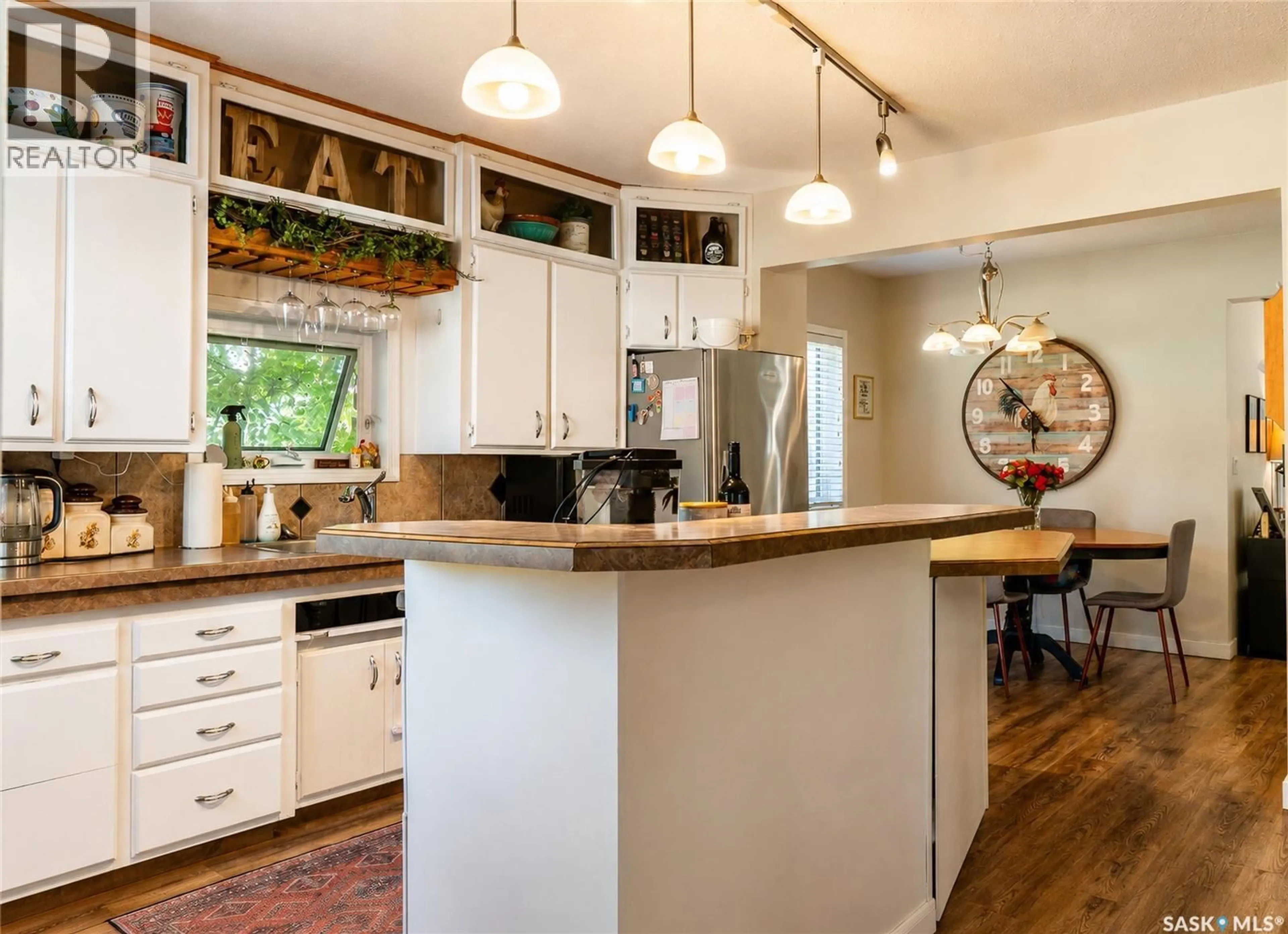 Open concept kitchen, wood/laminate floor for 608 2ND AVENUE, Cudworth Saskatchewan S0K1B0