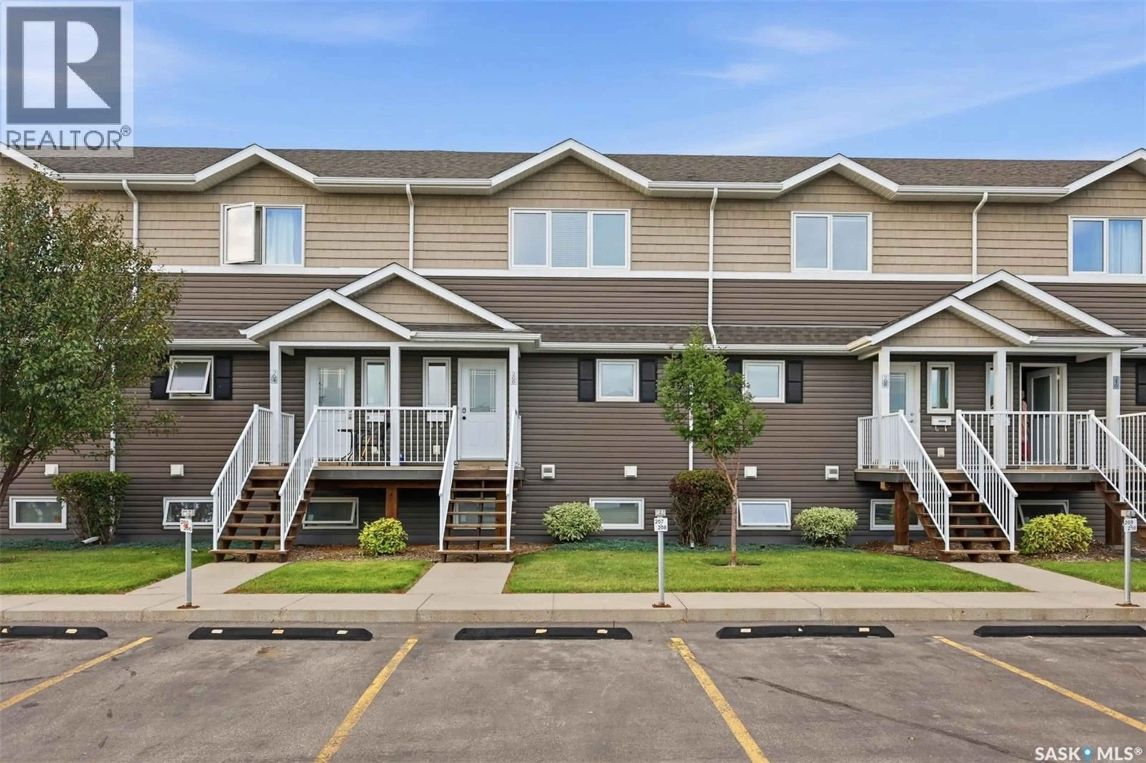 Home with vinyl exterior material, street for 206 275 PRINGLE LANE, Saskatoon Saskatchewan S7T0T5
