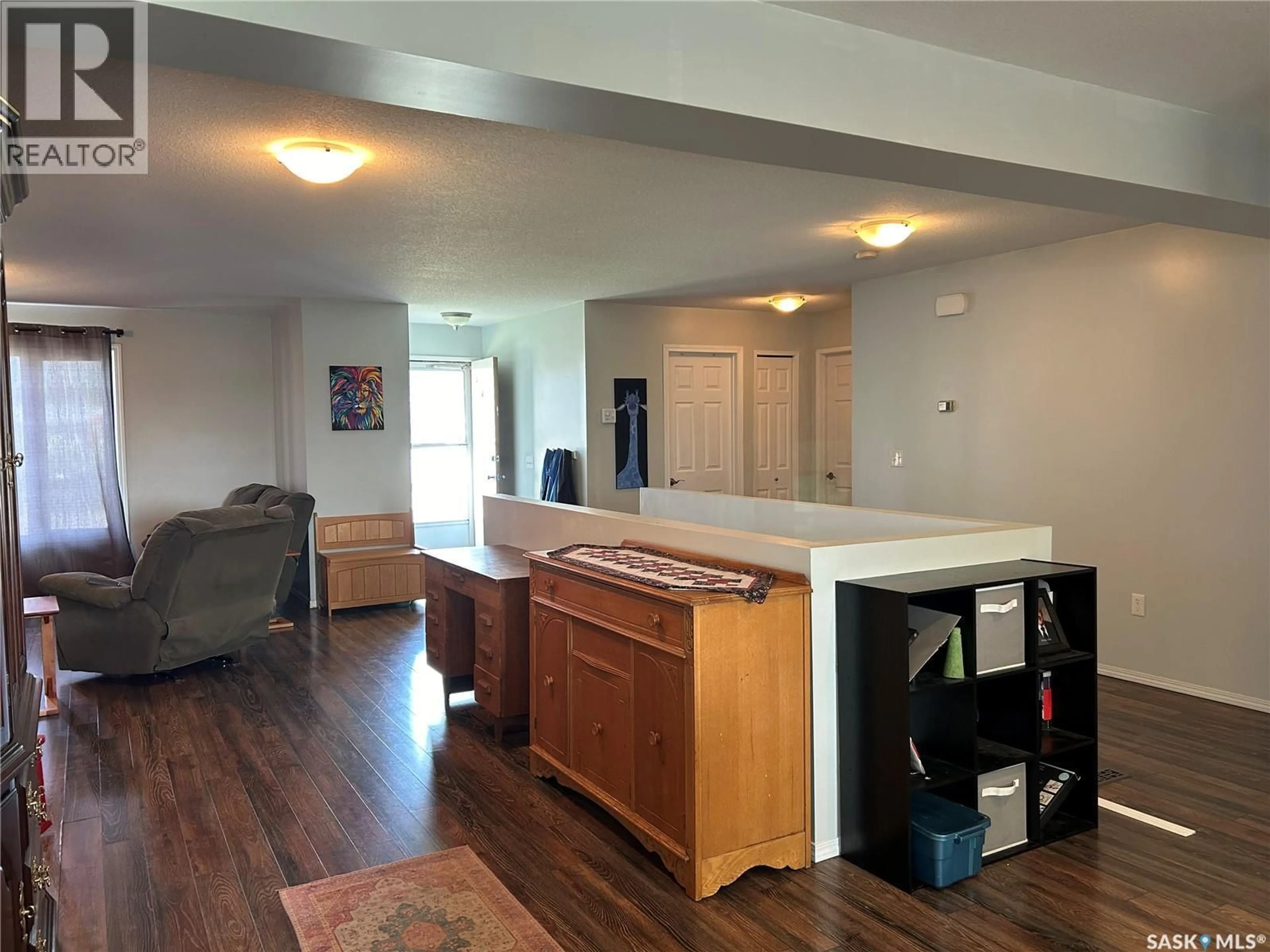 Open concept kitchen, wood/laminate floor for 615 1ST AVENUE, Bruno Saskatchewan S0K0S0