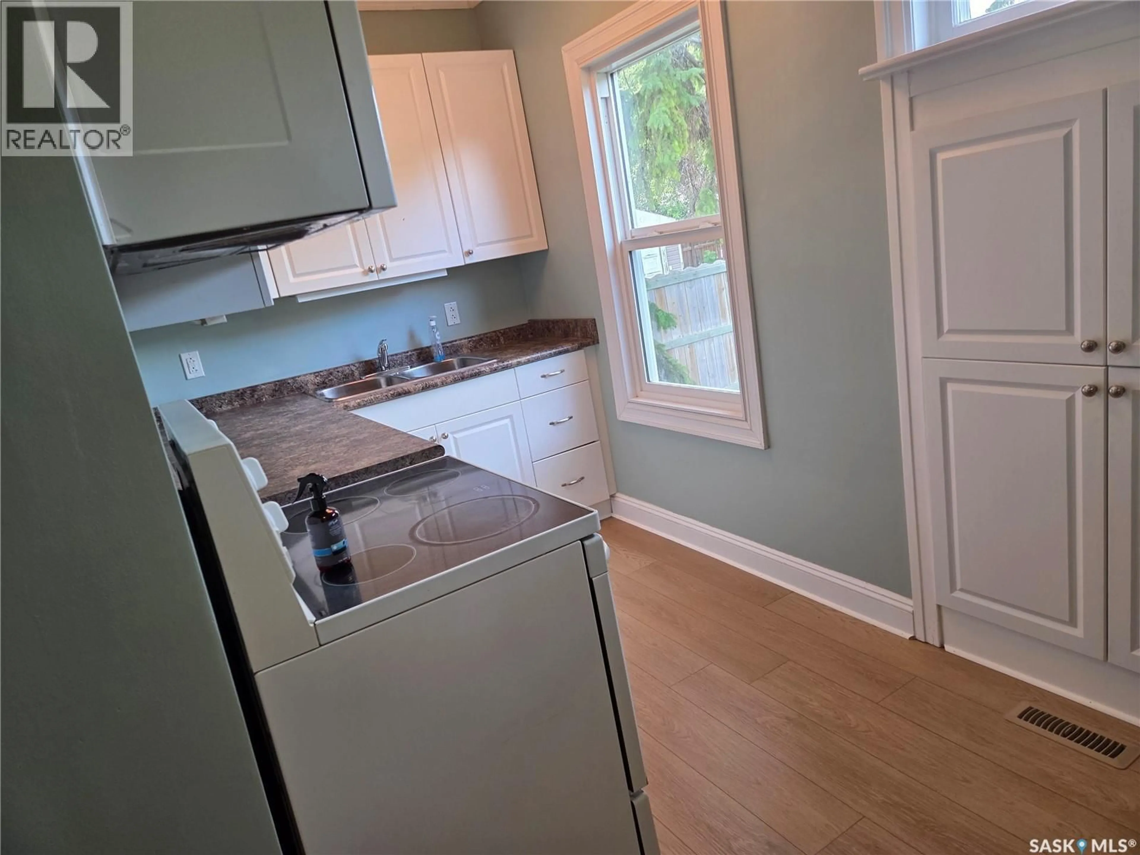 Standard kitchen, wood/laminate floor for 1001 104TH AVENUE, Tisdale Saskatchewan S0E1T0