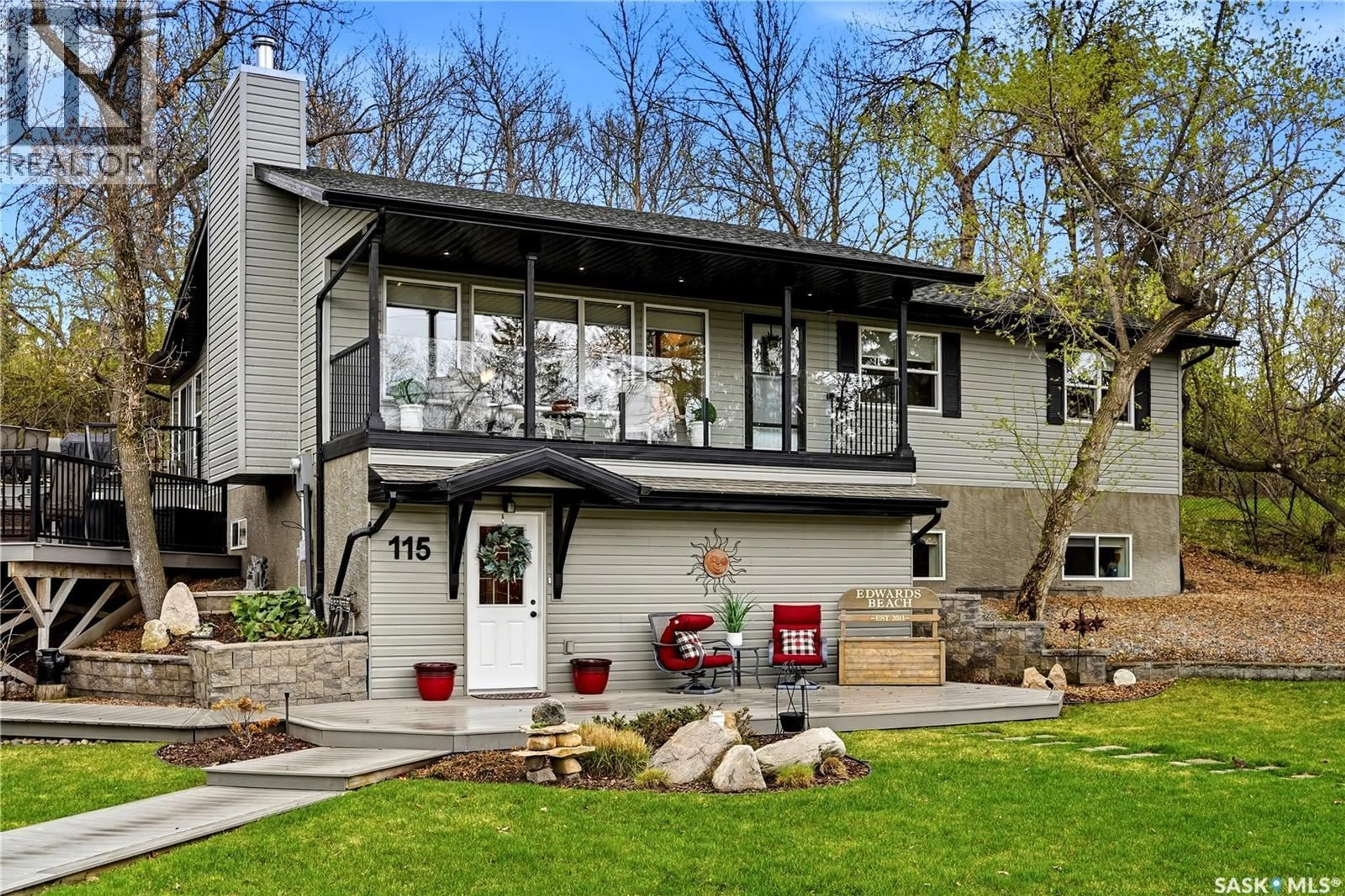 Home with vinyl exterior material, street for 115 CEDAR CRESCENT, Last Mountain Lake IR 80a Saskatchewan S0G4C0