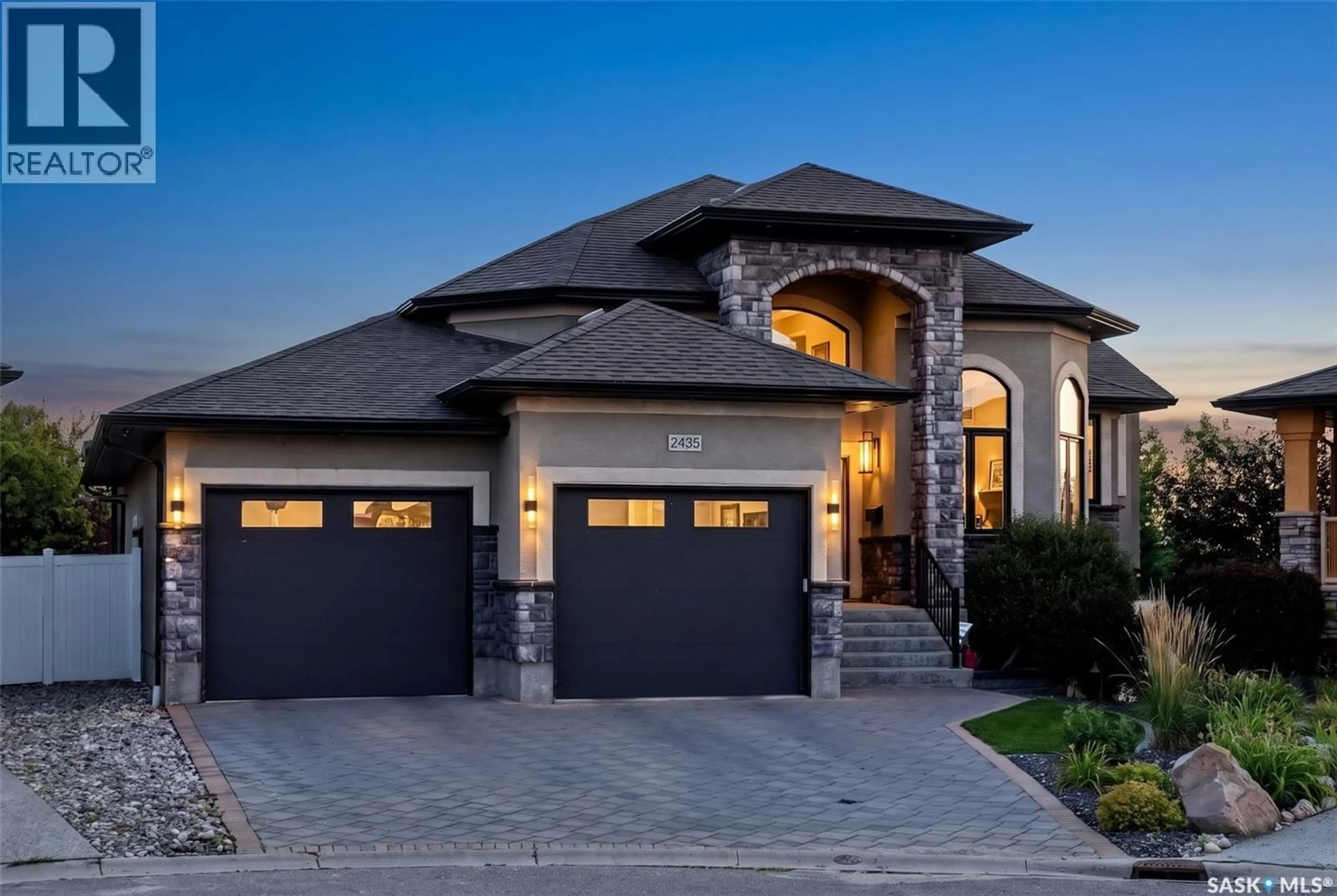 Home with brick exterior material, street for 2435 LINNER BAY, Regina Saskatchewan S4V1K3