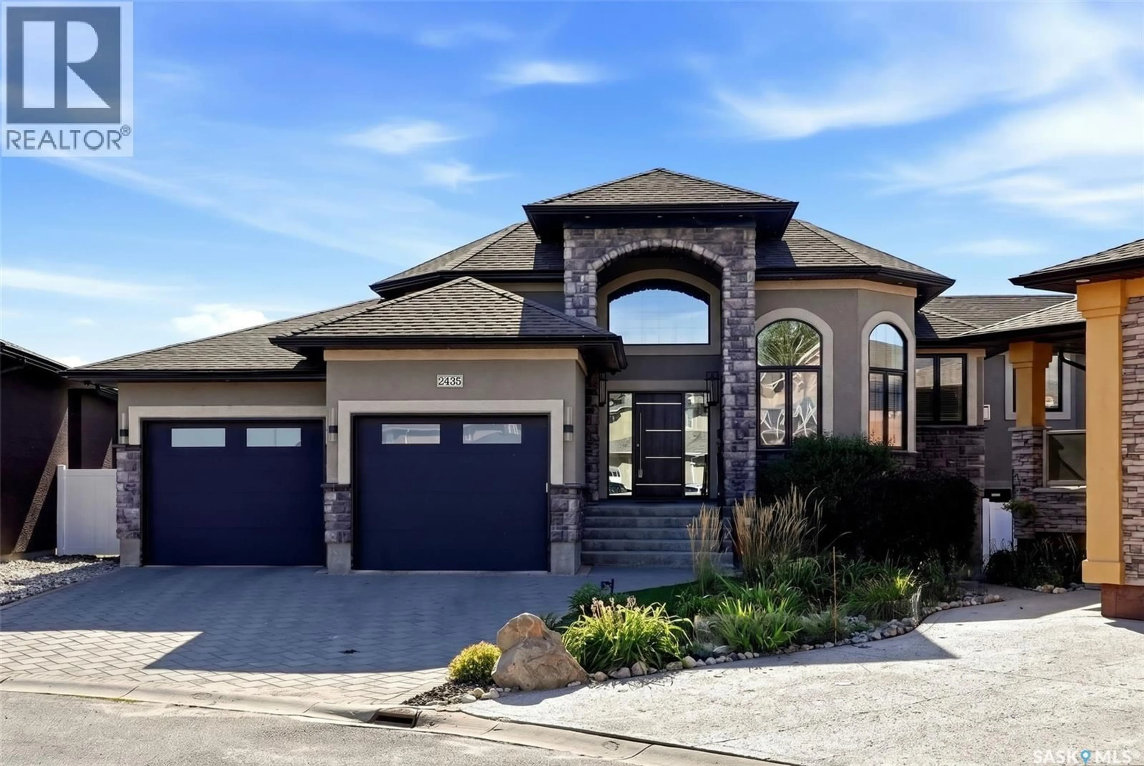 Home with brick exterior material, street for 2435 LINNER BAY, Regina Saskatchewan S4V1K3