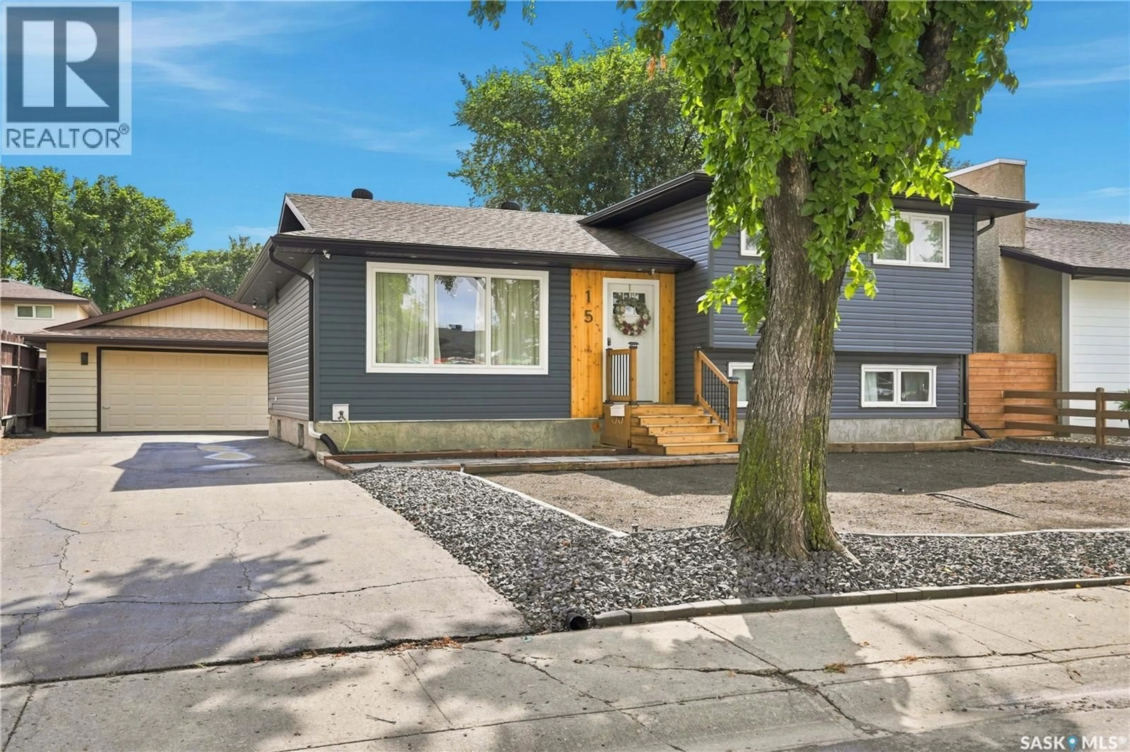 Home with vinyl exterior material, street for 15 RENDEK CRESCENT, Regina Saskatchewan S4X1H7