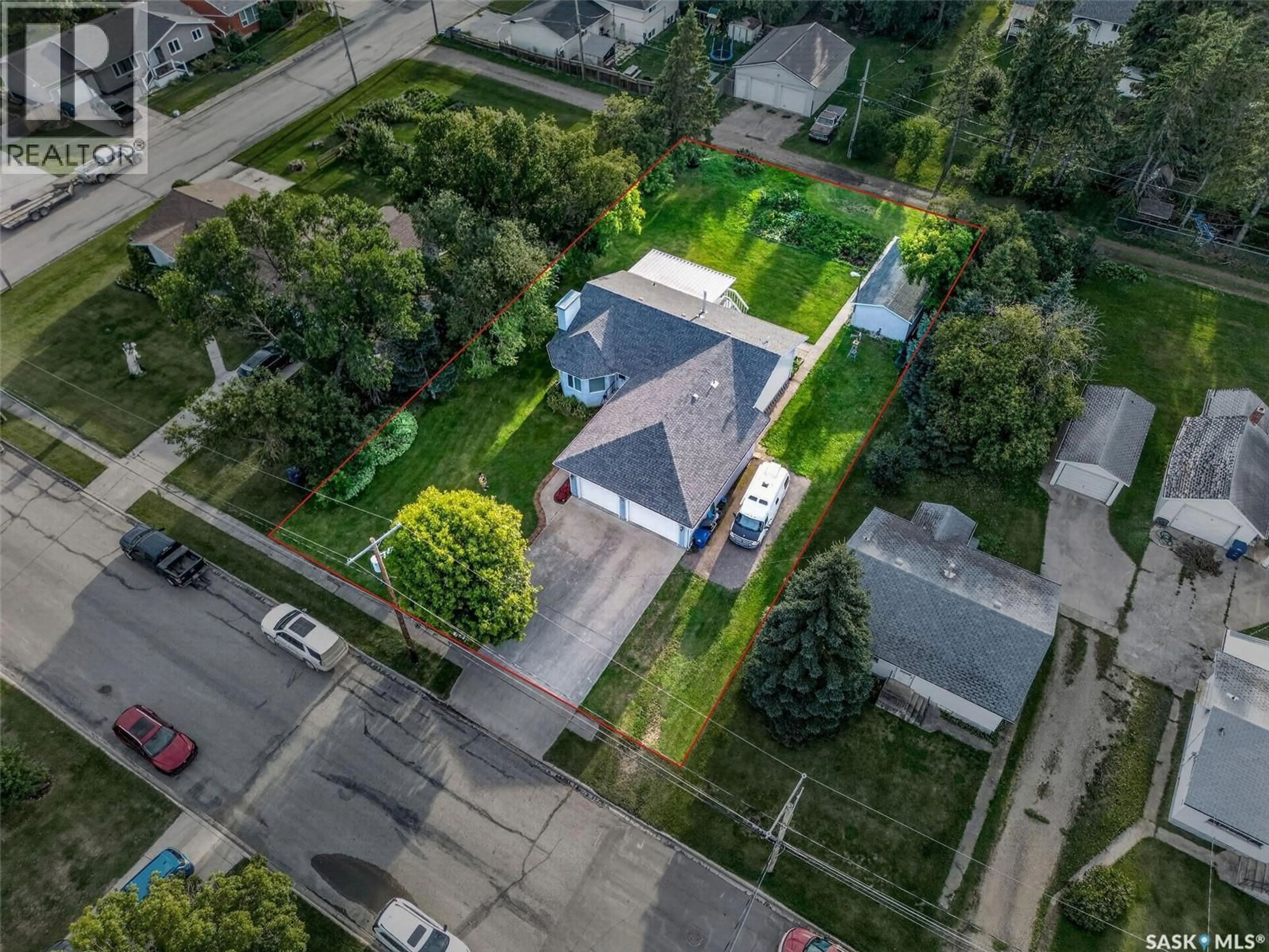 A pic from outside/outdoor area/front of a property/back of a property/a pic from drone, street for 720 6TH AVENUE, Rosthern Saskatchewan S0K3R0