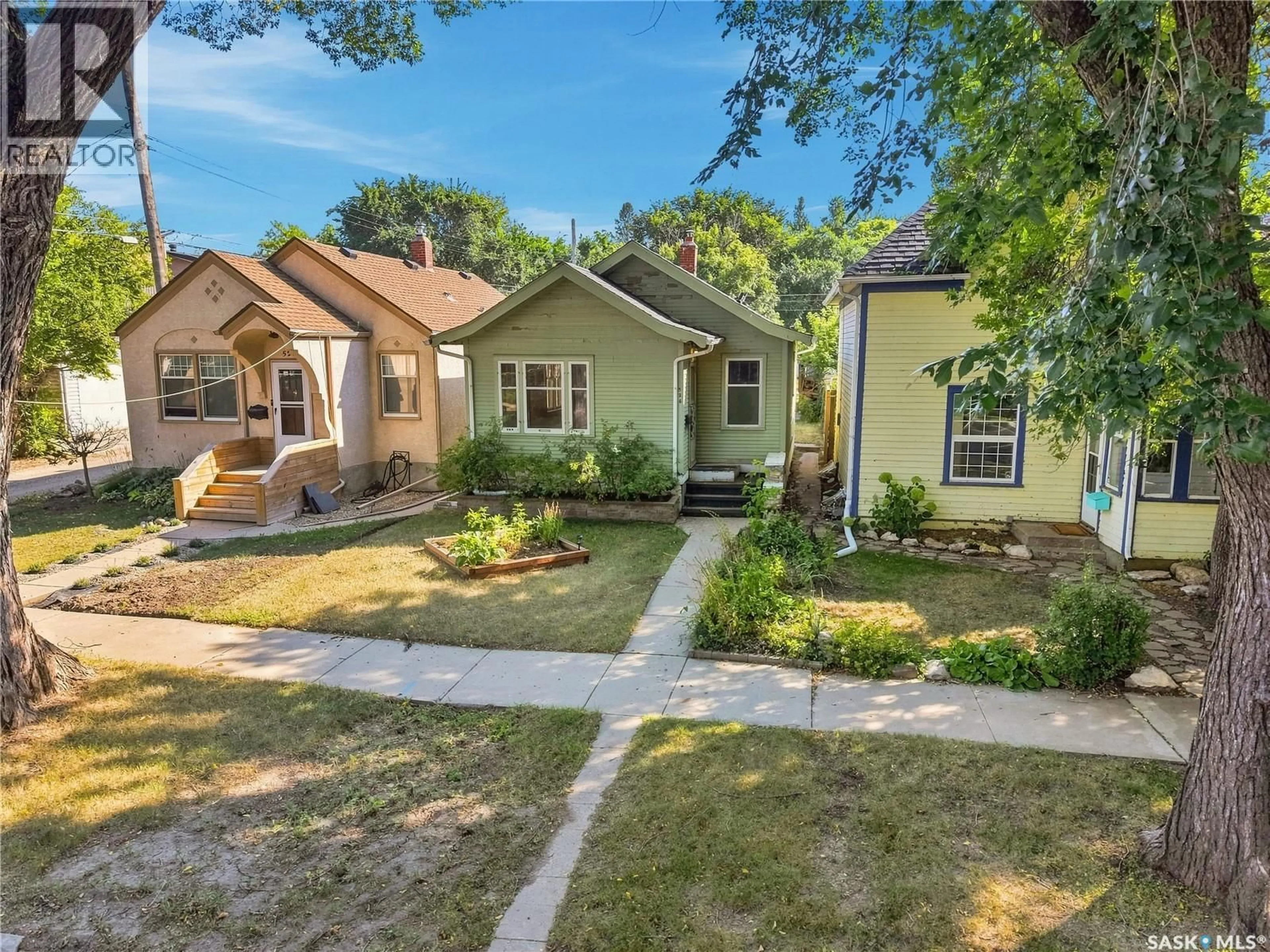 A pic from outside/outdoor area/front of a property/back of a property/a pic from drone, street for 526 7TH STREET, Saskatoon Saskatchewan S7H0X7