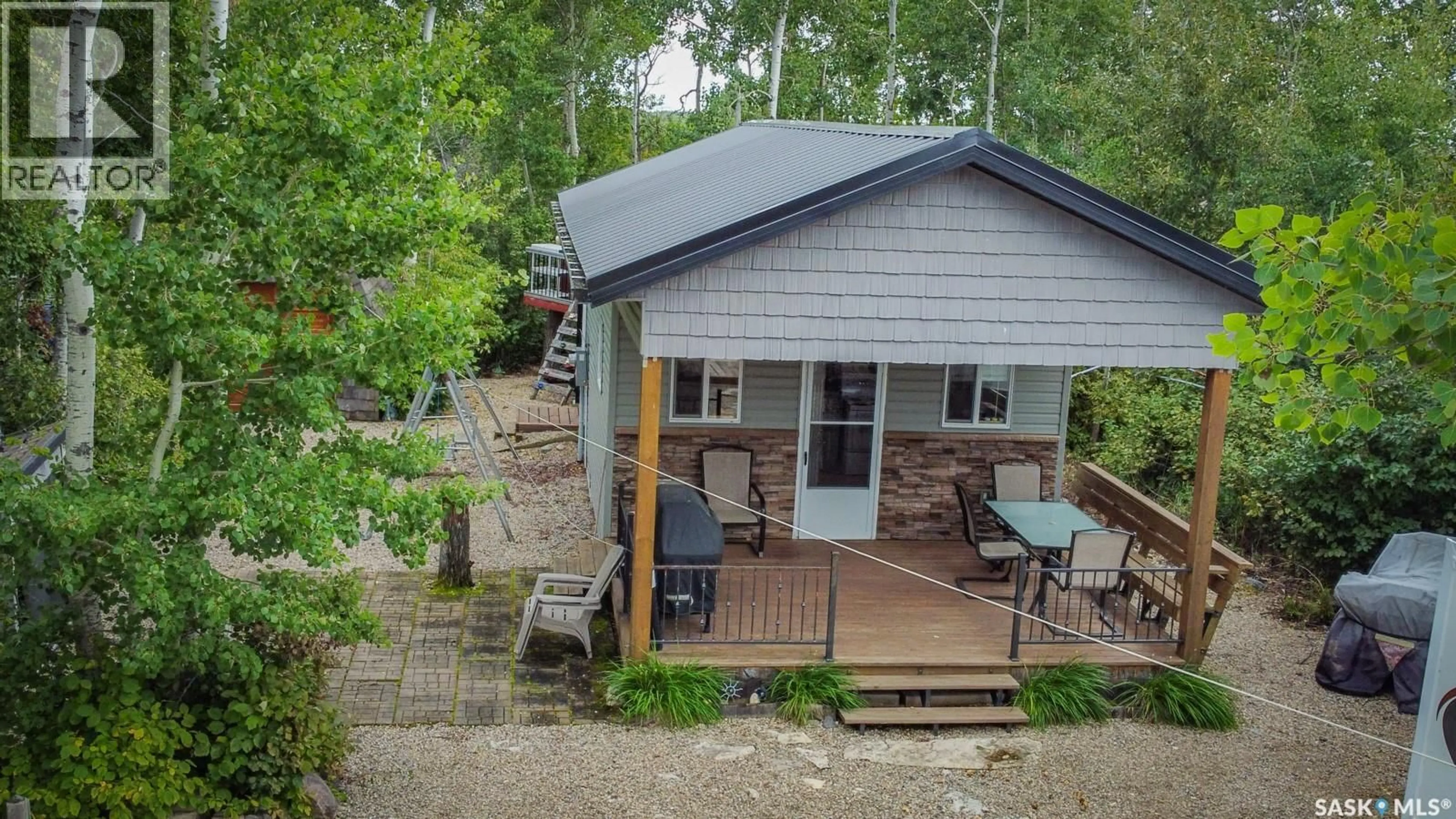 A pic from outside/outdoor area/front of a property/back of a property/a pic from drone, unknown for 212 - 212 POPLAR STREET, Lake Lenore Rm No. 399 Saskatchewan S0K3V0