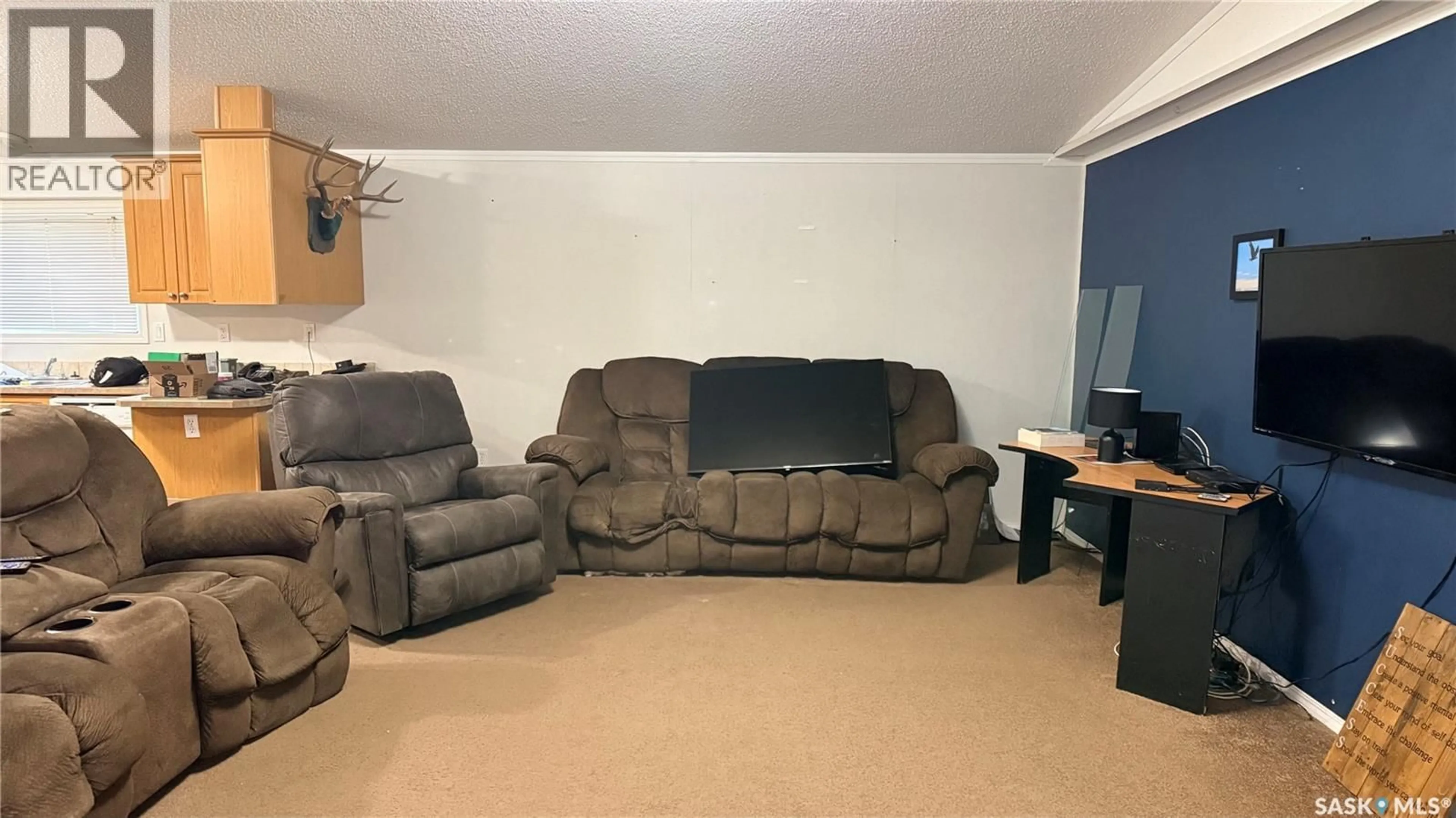 Living room with furniture, unknown for GREEN - 222 WILLOW PARK, Estevan Saskatchewan S4A2R7