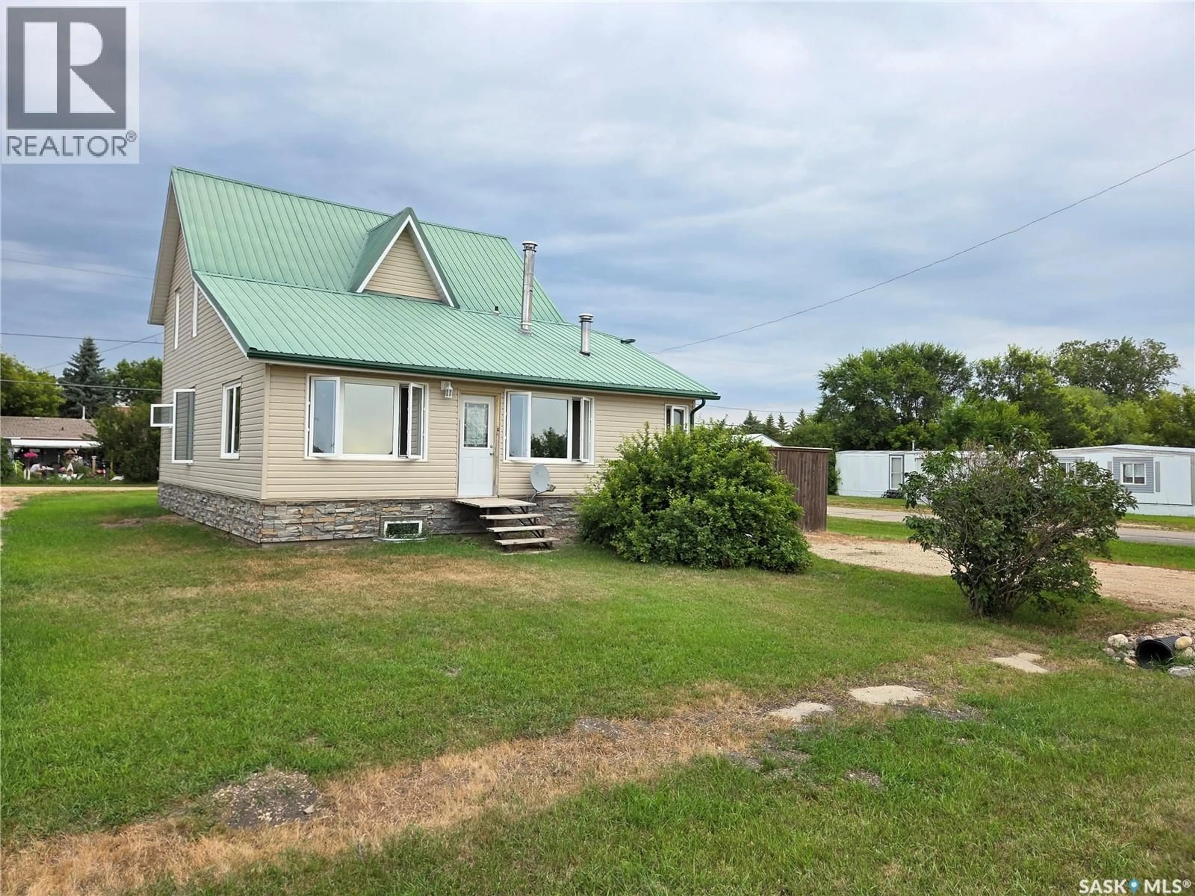 A pic from outside/outdoor area/front of a property/back of a property/a pic from drone, unknown for 620 RAILWAY AVENUE, Arcola Saskatchewan S0C0G0
