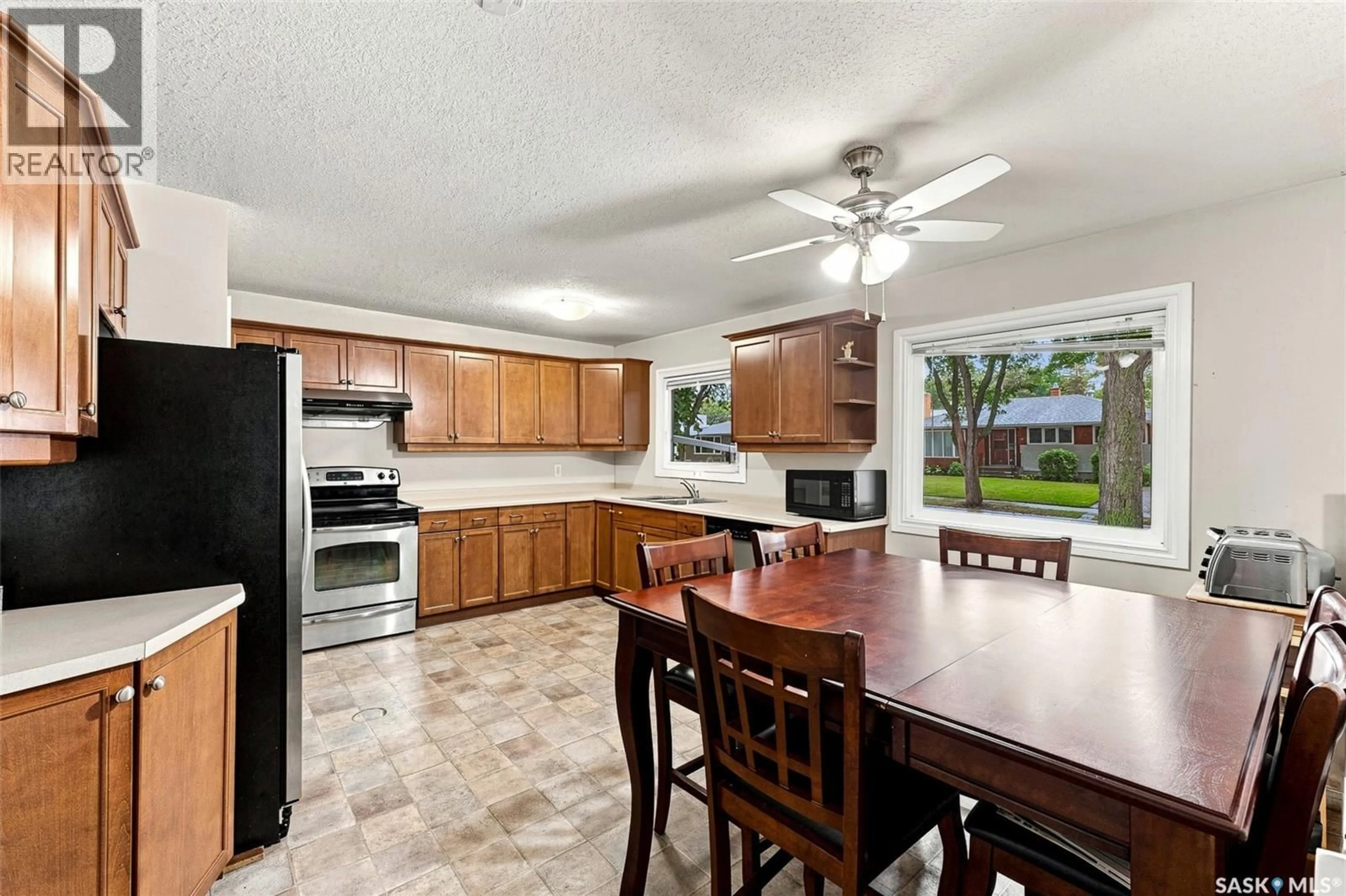 Open concept kitchen, ceramic/tile floor for 1520 UHRICH AVENUE, Regina Saskatchewan S4S4R5