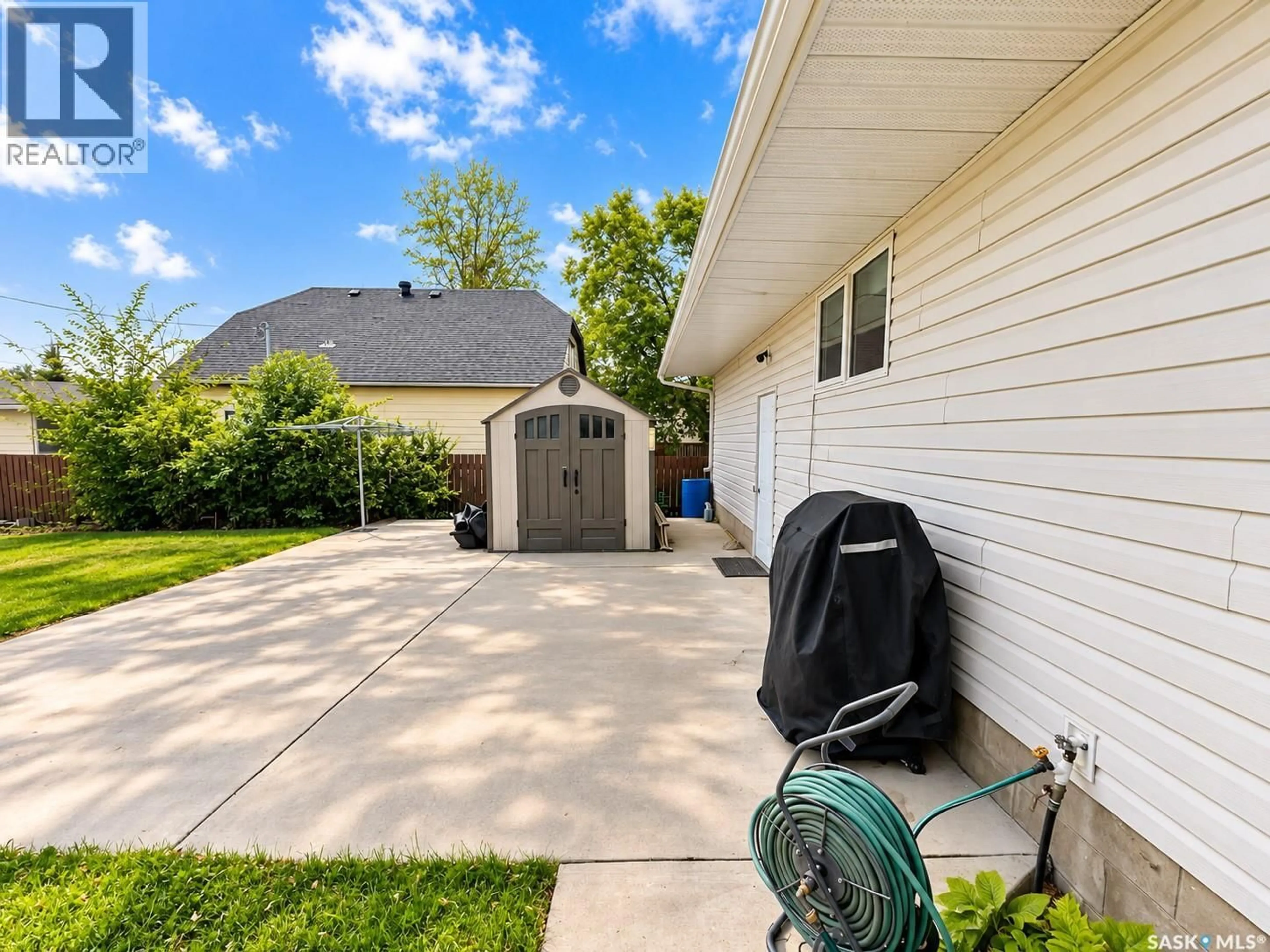 Home with vinyl exterior material, street for 206 1ST STREET, Dalmeny Saskatchewan S0K1E0