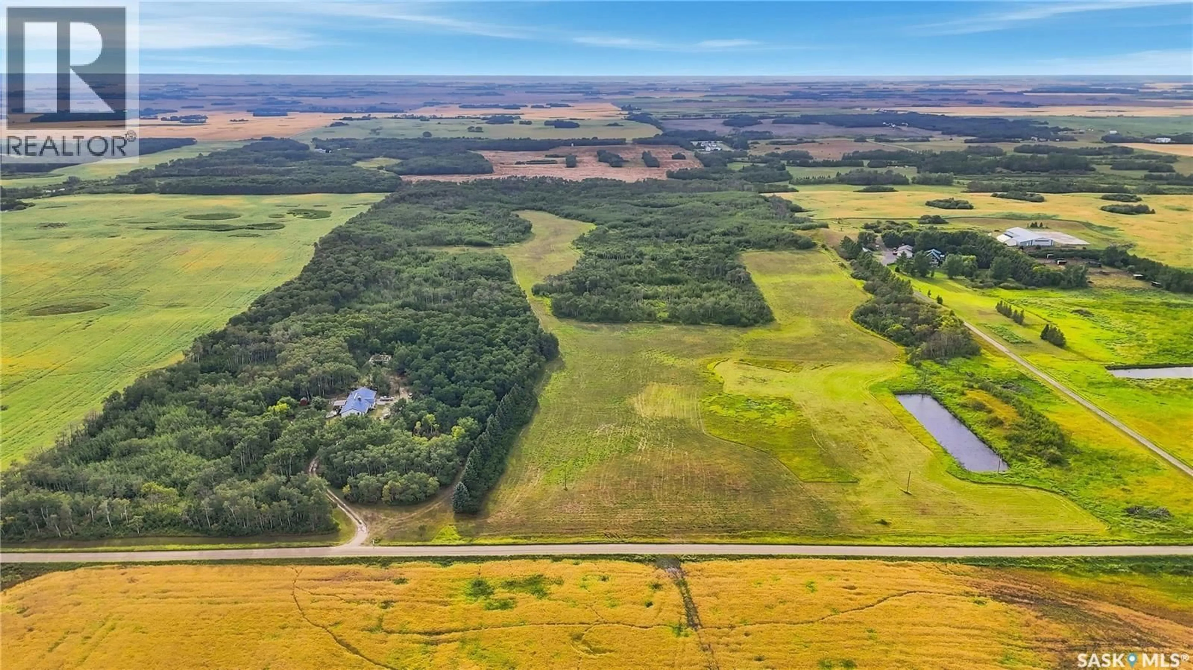 A pic from outside/outdoor area/front of a property/back of a property/a pic from drone, water/lake/river/ocean view for RM Edenwold No - 158 FABIAN ACERAGE, Edenwold Rm No.158 Saskatchewan S0G3Z0