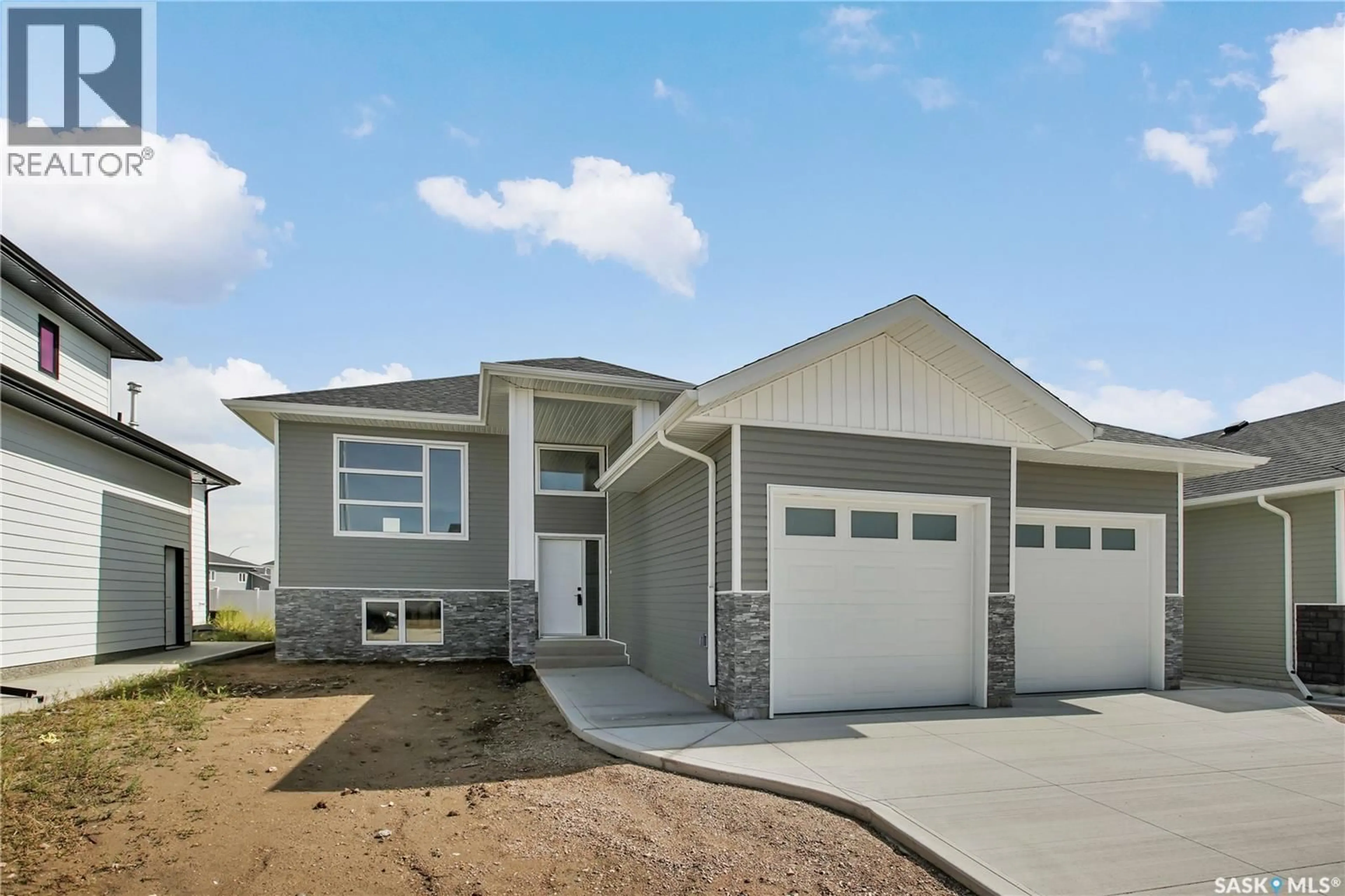 Home with vinyl exterior material, street for 836 BALLESTEROS CRESCENT, Warman Saskatchewan S0K4S4