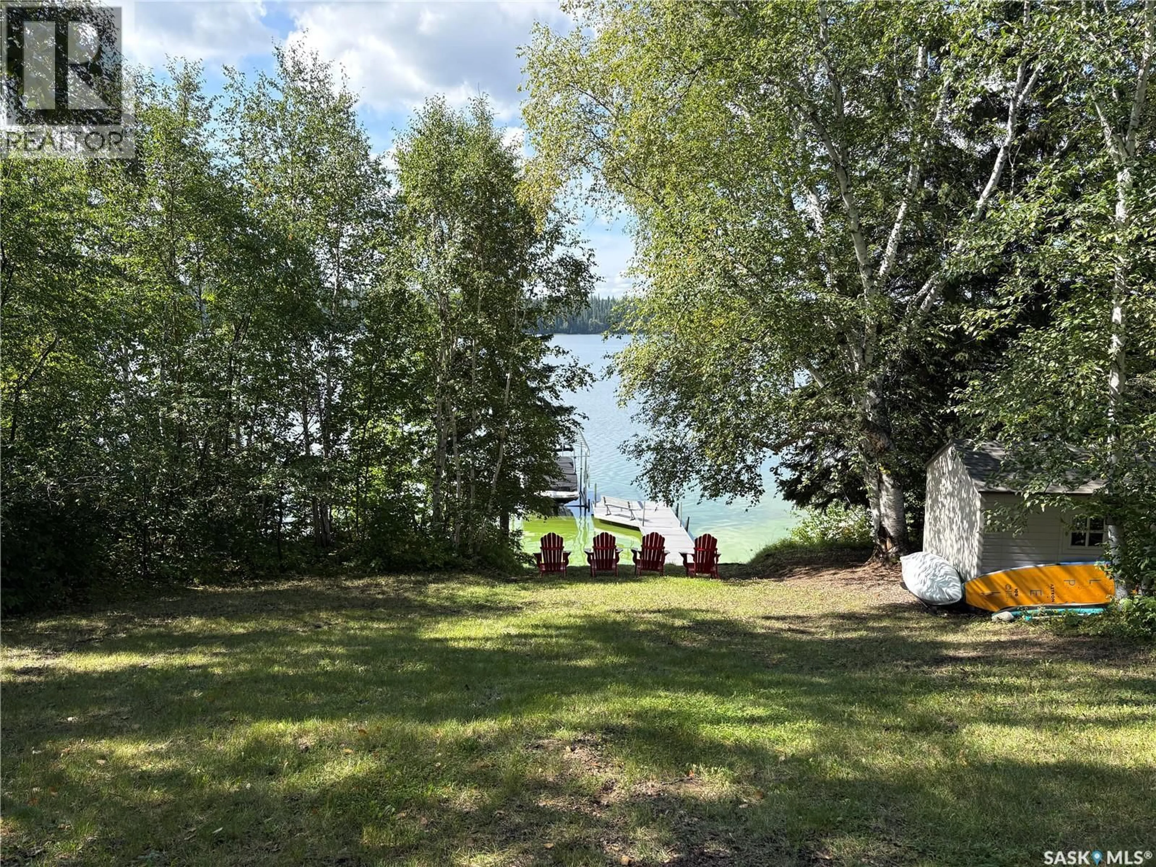 A pic from outside/outdoor area/front of a property/back of a property/a pic from drone, water/lake/river/ocean view for 20 SUNSET COVE, Cowan Lake Saskatchewan S0J0E0