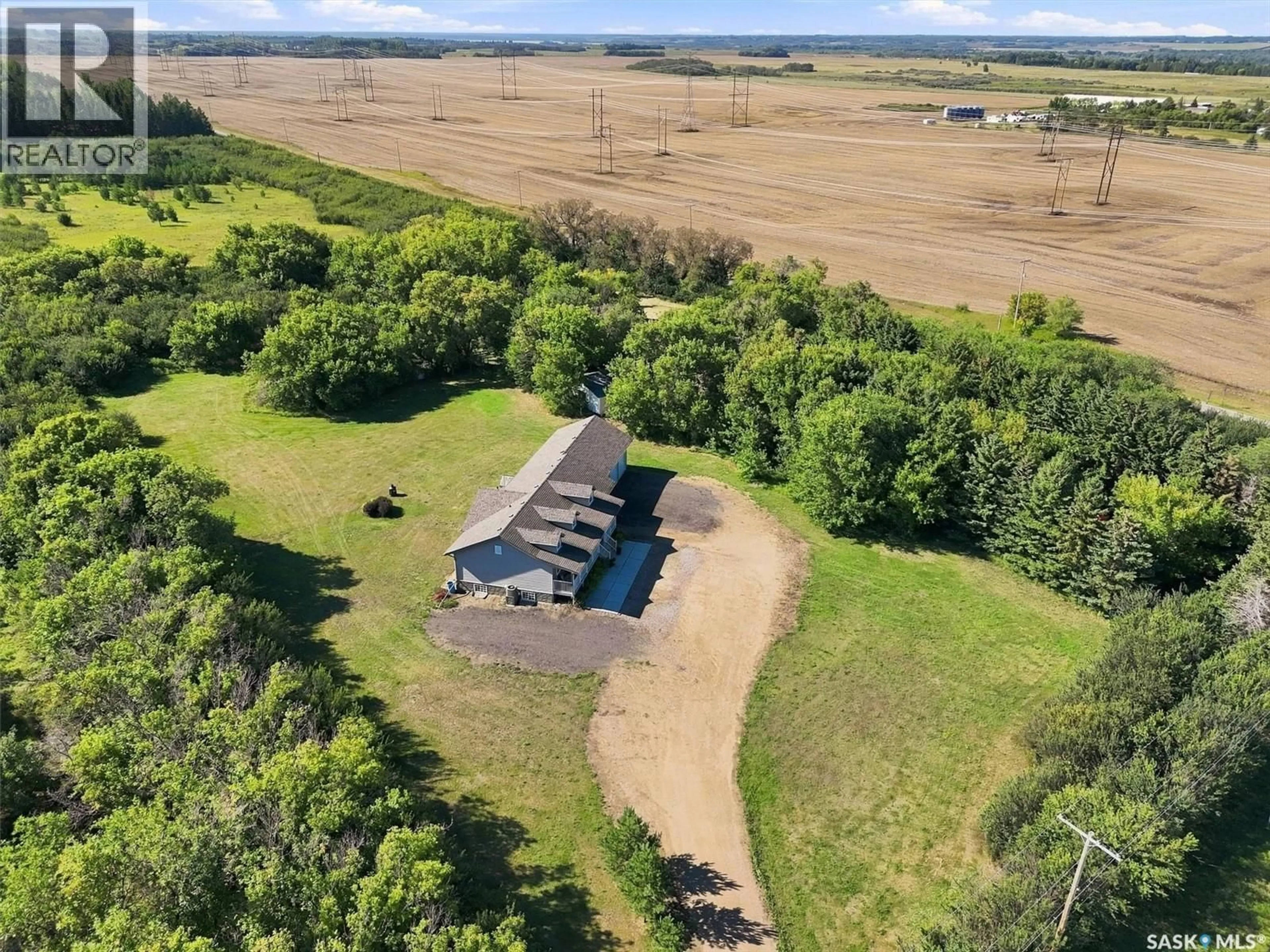 A pic from outside/outdoor area/front of a property/back of a property/a pic from drone, unknown for 1570 CARTWRIGHT STREET, Corman Park Rm No. 344 Saskatchewan S7T1B1