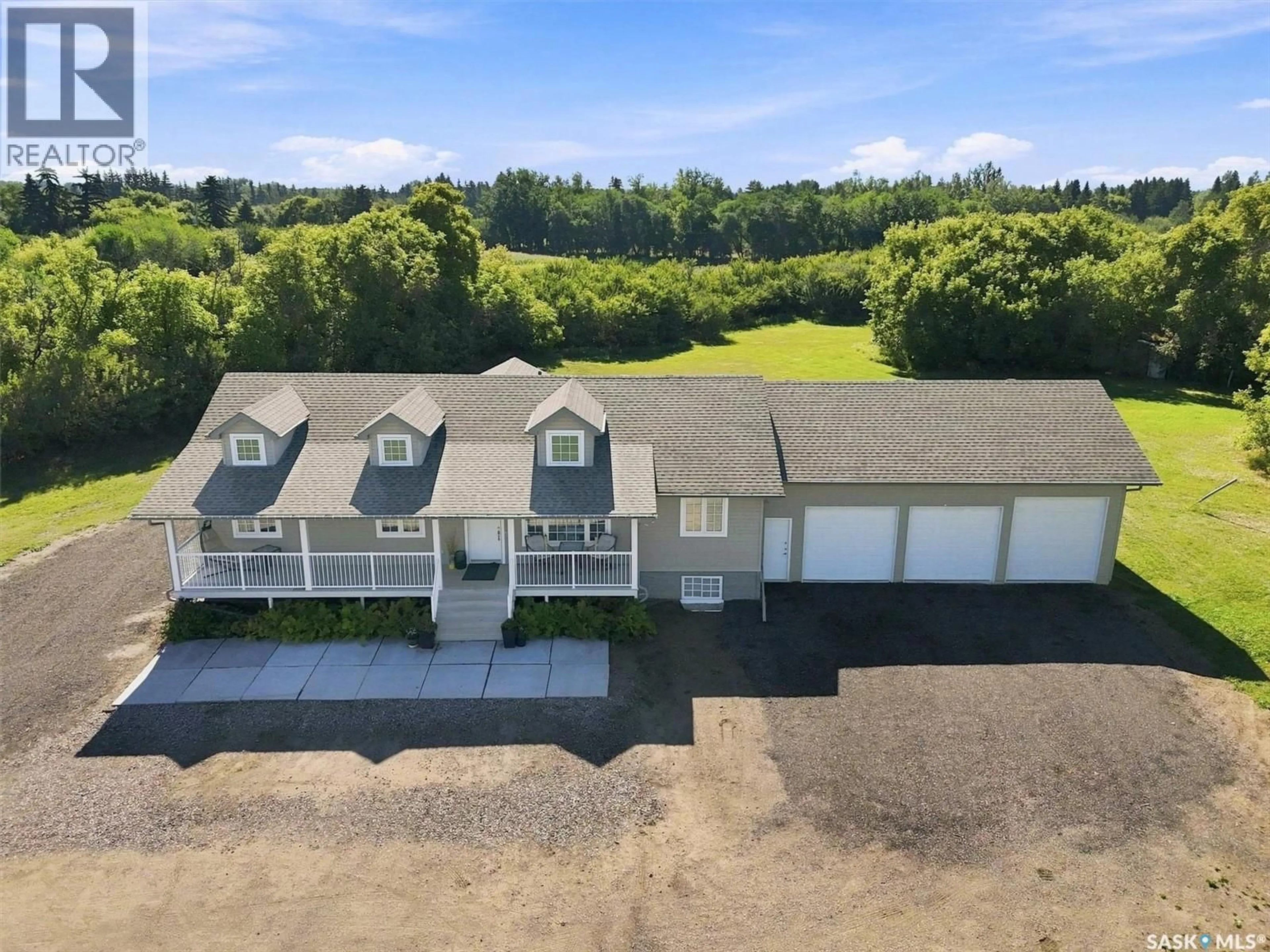A pic from outside/outdoor area/front of a property/back of a property/a pic from drone, water/lake/river/ocean view for 1570 CARTWRIGHT STREET, Corman Park Rm No. 344 Saskatchewan S7T1B1