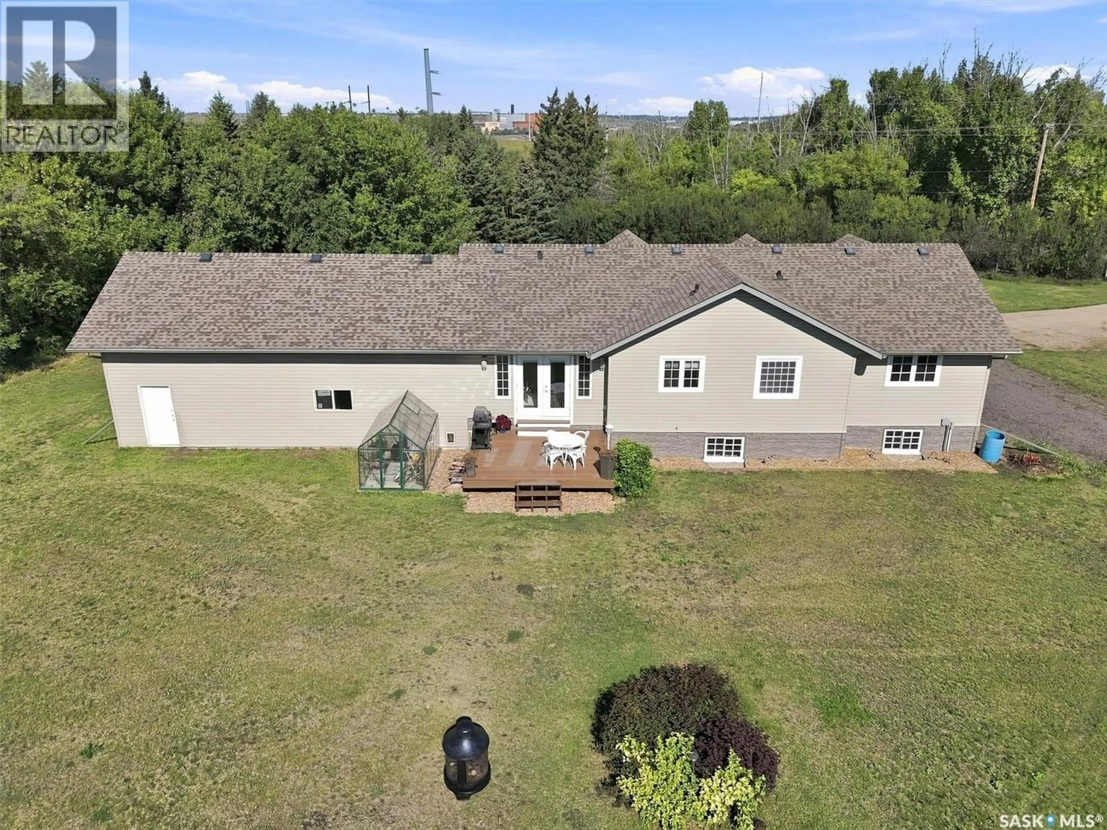 A pic from outside/outdoor area/front of a property/back of a property/a pic from drone, unknown for 1570 CARTWRIGHT STREET, Corman Park Rm No. 344 Saskatchewan S7T1B1