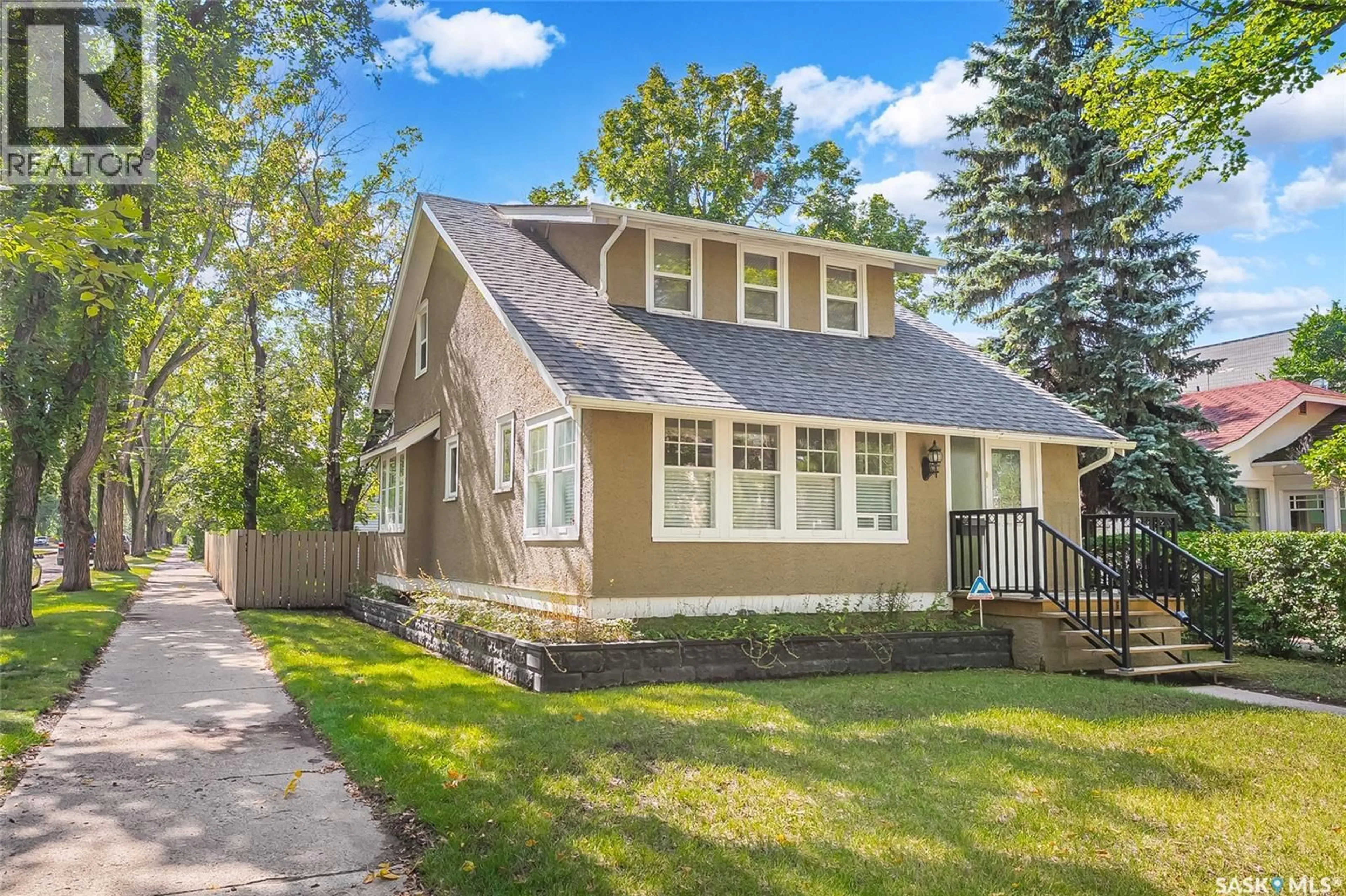 Home with vinyl exterior material, street for 234 10TH STREET, Saskatoon Saskatchewan S7N0C5