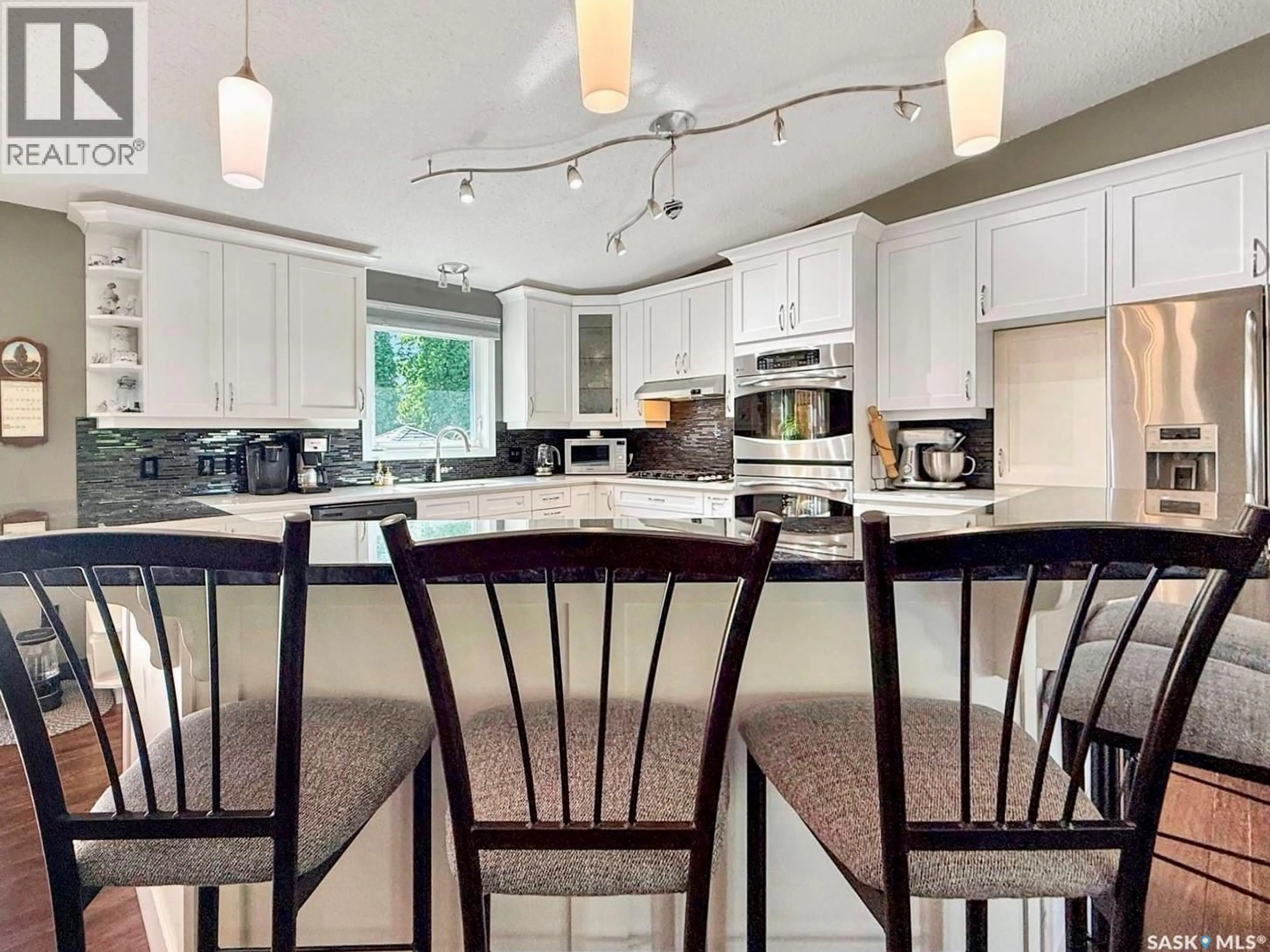 Open concept kitchen, ceramic/tile floor for 3309 EAGLE CRESCENT, Prince Albert Saskatchewan S6V7R1