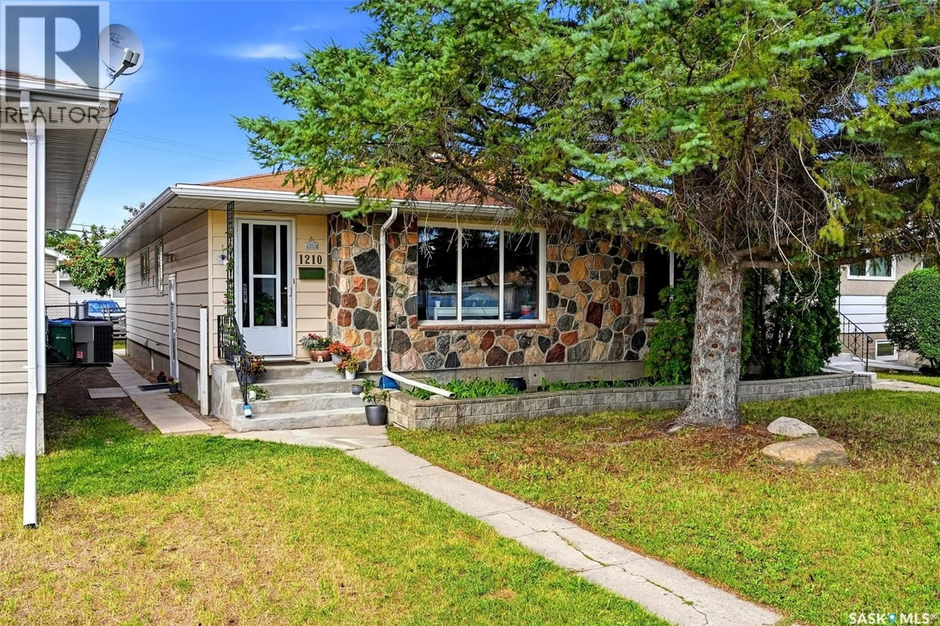 Home with brick exterior material, street for 1210-1212 DEWDNEY AVENUE, Regina Saskatchewan S4N0E3