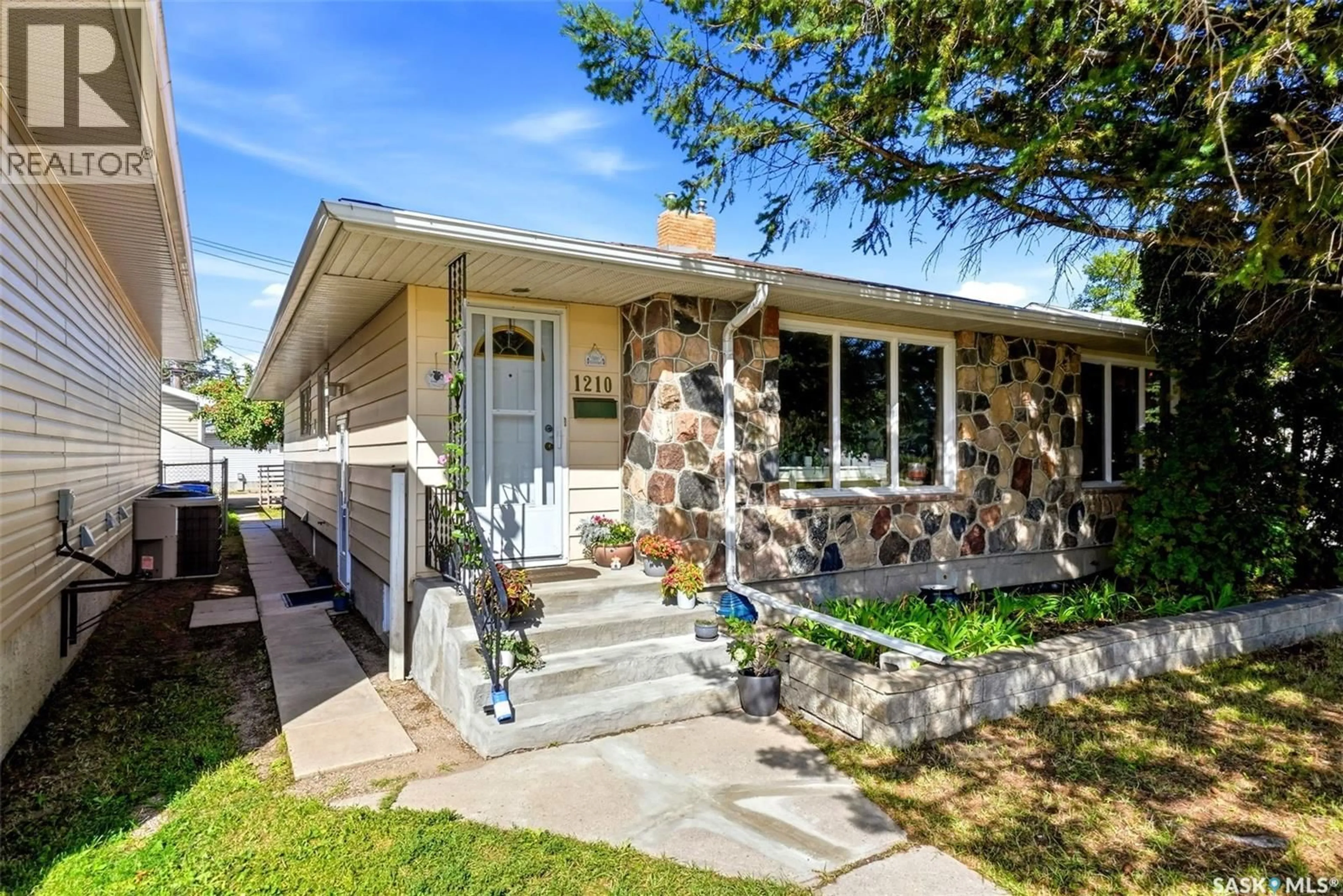 Home with vinyl exterior material, street for 1210-1212 DEWDNEY AVENUE, Regina Saskatchewan S4N0E3