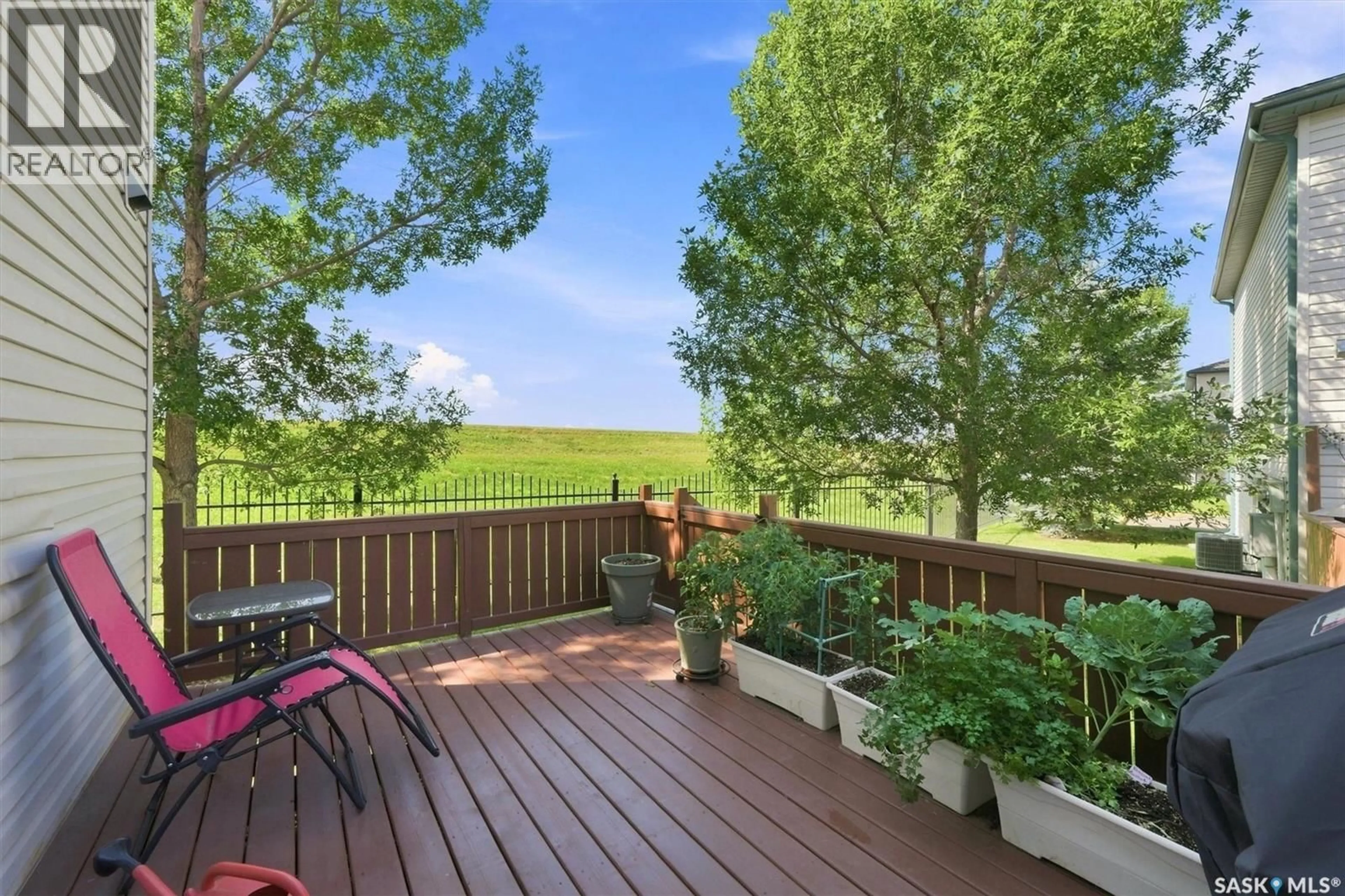 Patio, water/lake/river/ocean view for 124 663 BECKETT CRESCENT, Saskatoon Saskatchewan S7N4X2
