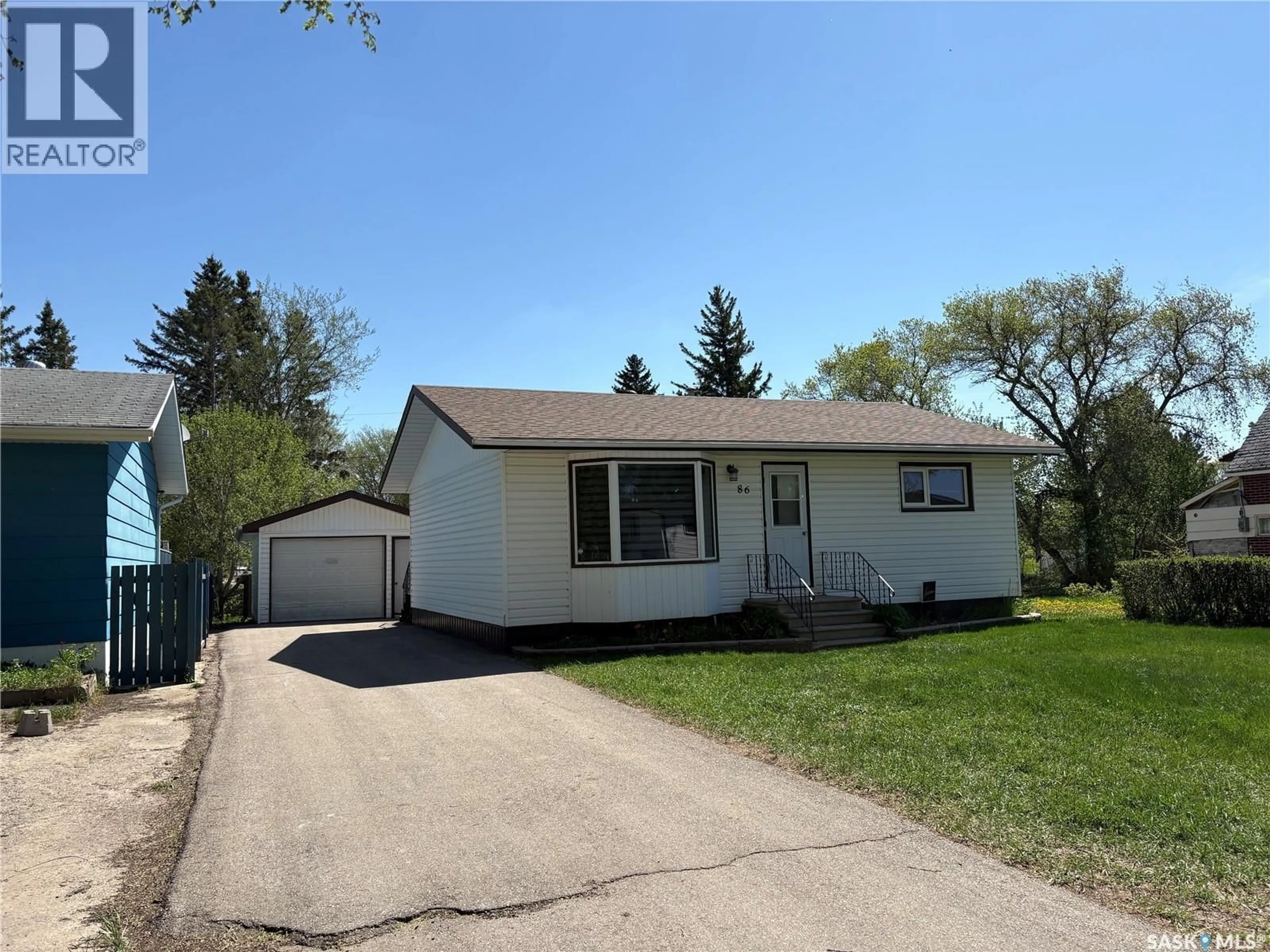 Home with vinyl exterior material, street for 86 1ST STREET, Wadena Saskatchewan S0A4J0