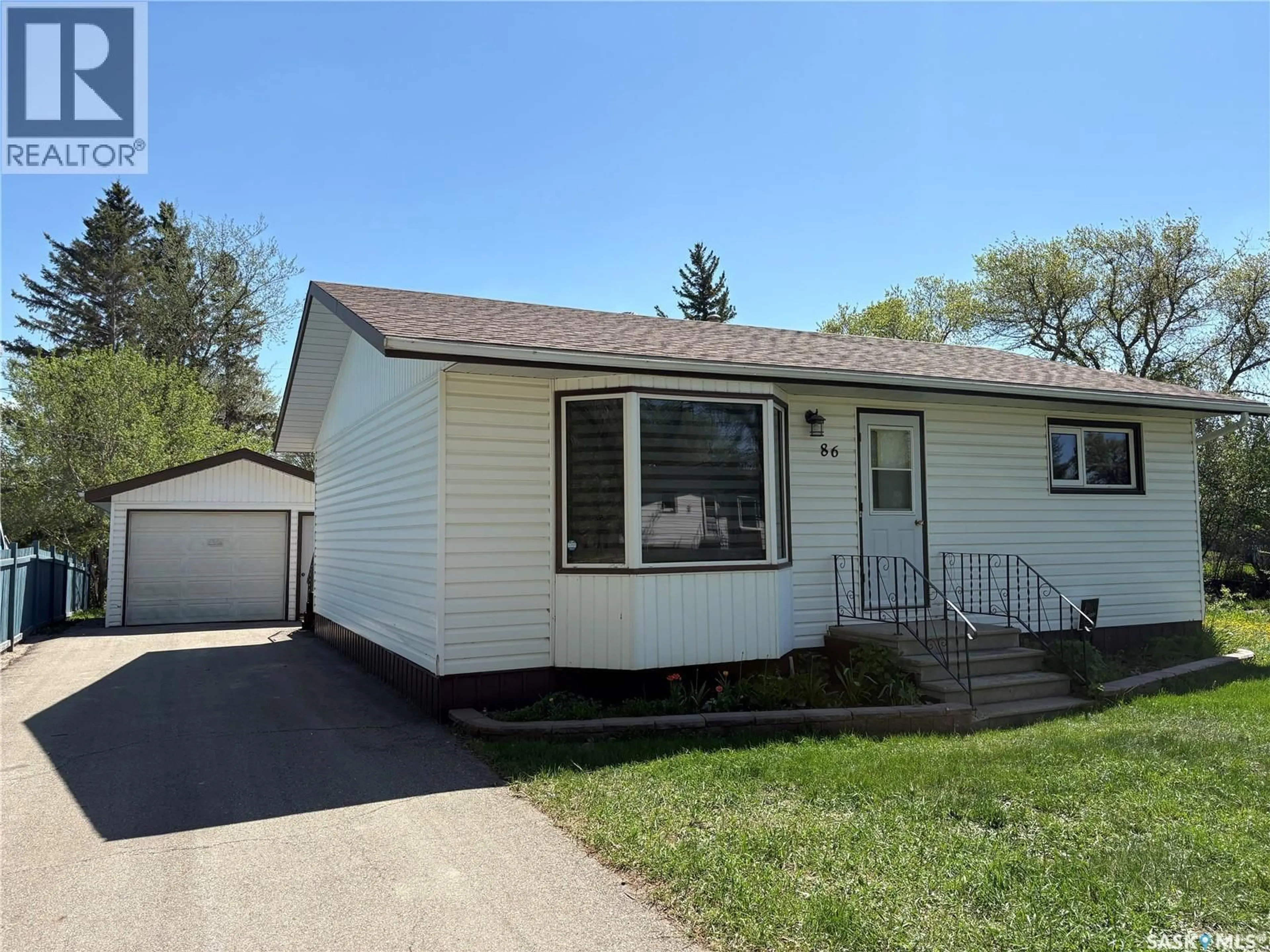 Home with vinyl exterior material, street for 86 1ST STREET, Wadena Saskatchewan S0A4J0