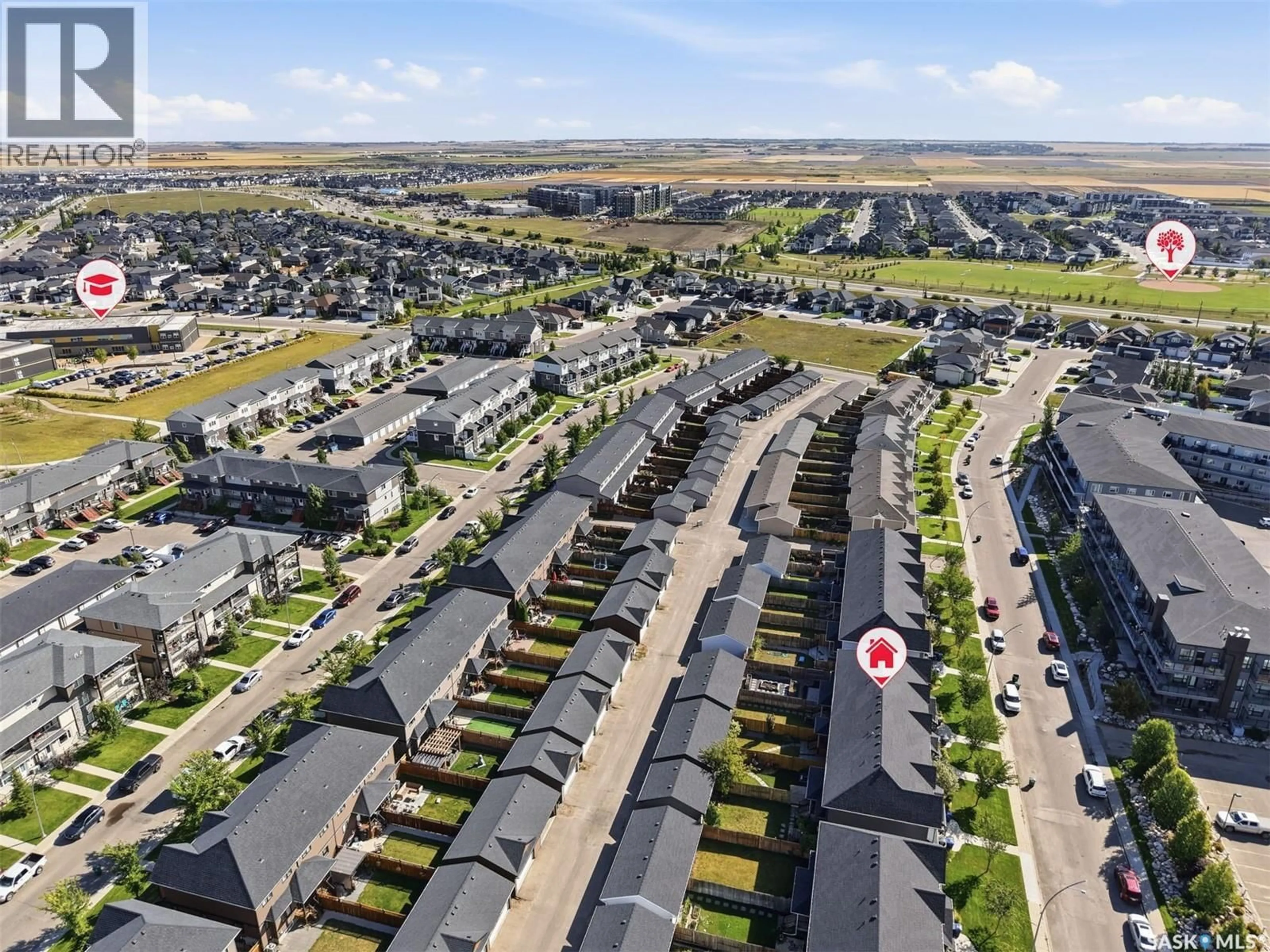 A pic from outside/outdoor area/front of a property/back of a property/a pic from drone, street for 326 MANINGAS BEND, Saskatoon Saskatchewan S7W0V8
