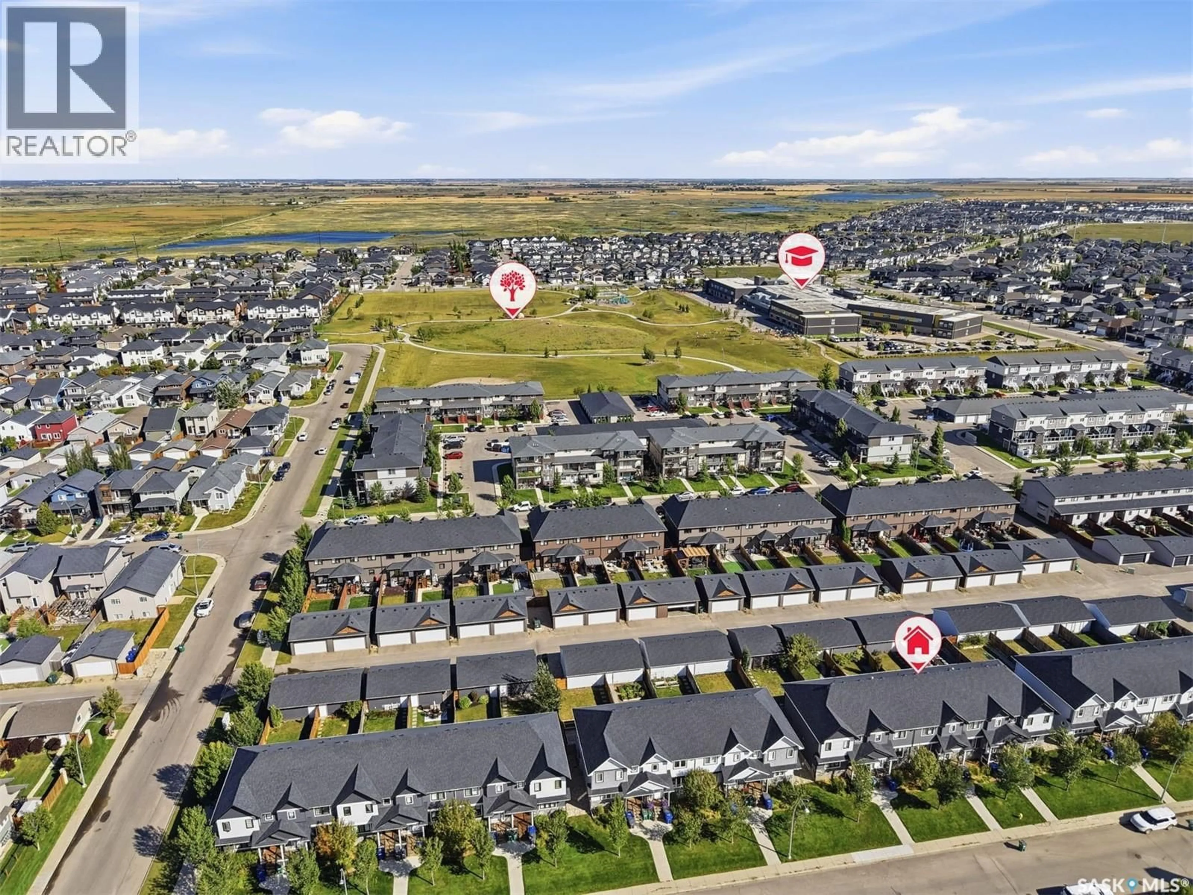 A pic from outside/outdoor area/front of a property/back of a property/a pic from drone, unknown for 326 MANINGAS BEND, Saskatoon Saskatchewan S7W0V8
