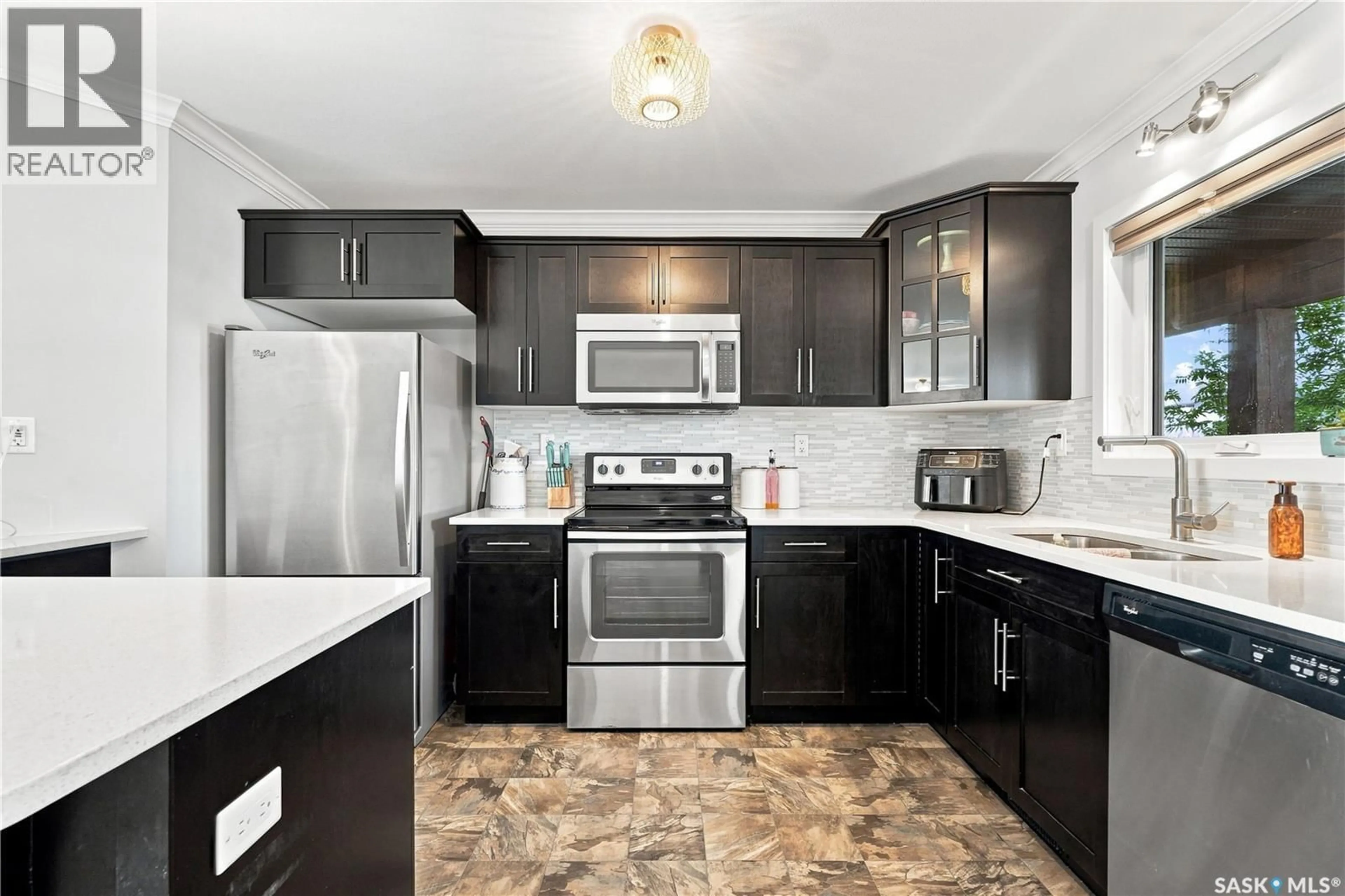 Standard kitchen, ceramic/tile floor for 250 - 259 AKHTAR BEND, Saskatoon Saskatchewan S7W0W4