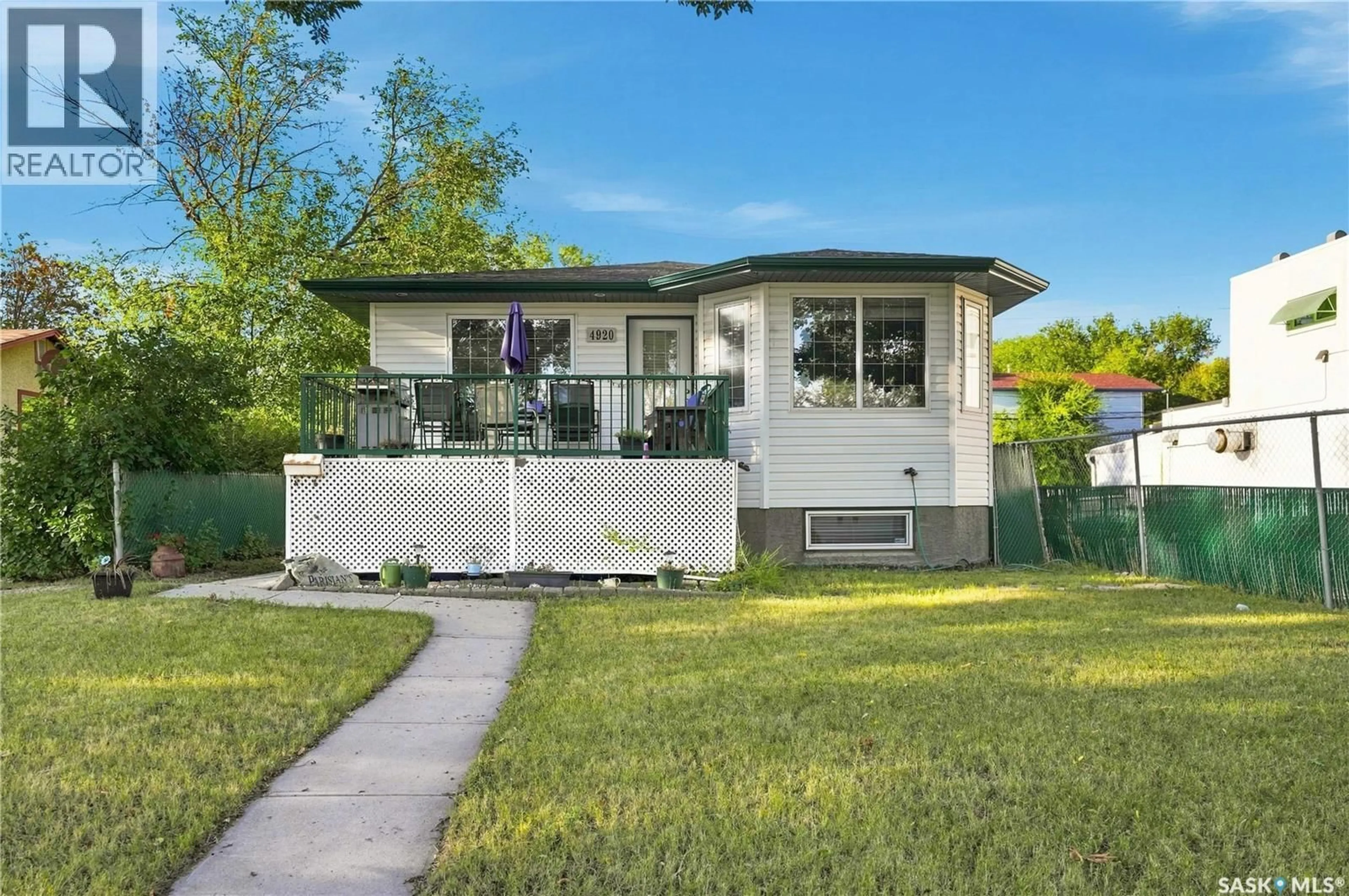 Home with vinyl exterior material, street for 4920 DEWDNEY AVENUE, Regina Saskatchewan S4T1B8