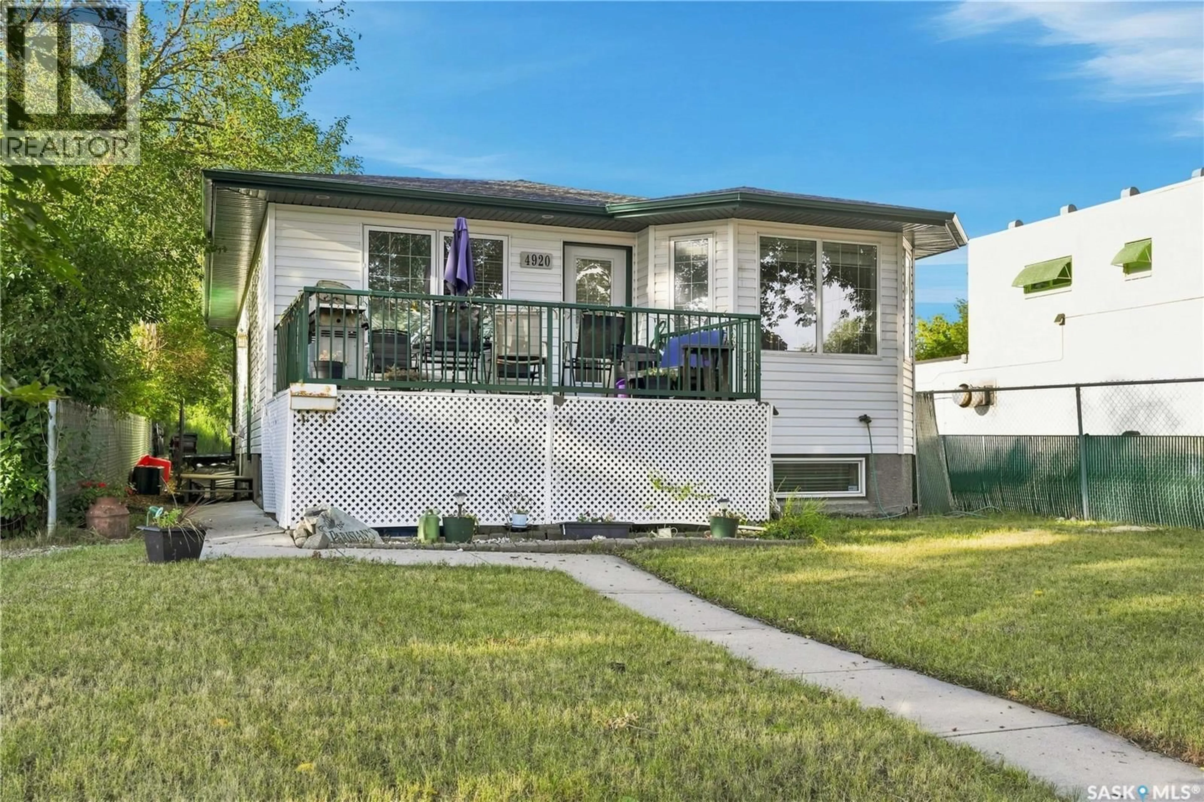 Home with vinyl exterior material, street for 4920 DEWDNEY AVENUE, Regina Saskatchewan S4T1B8