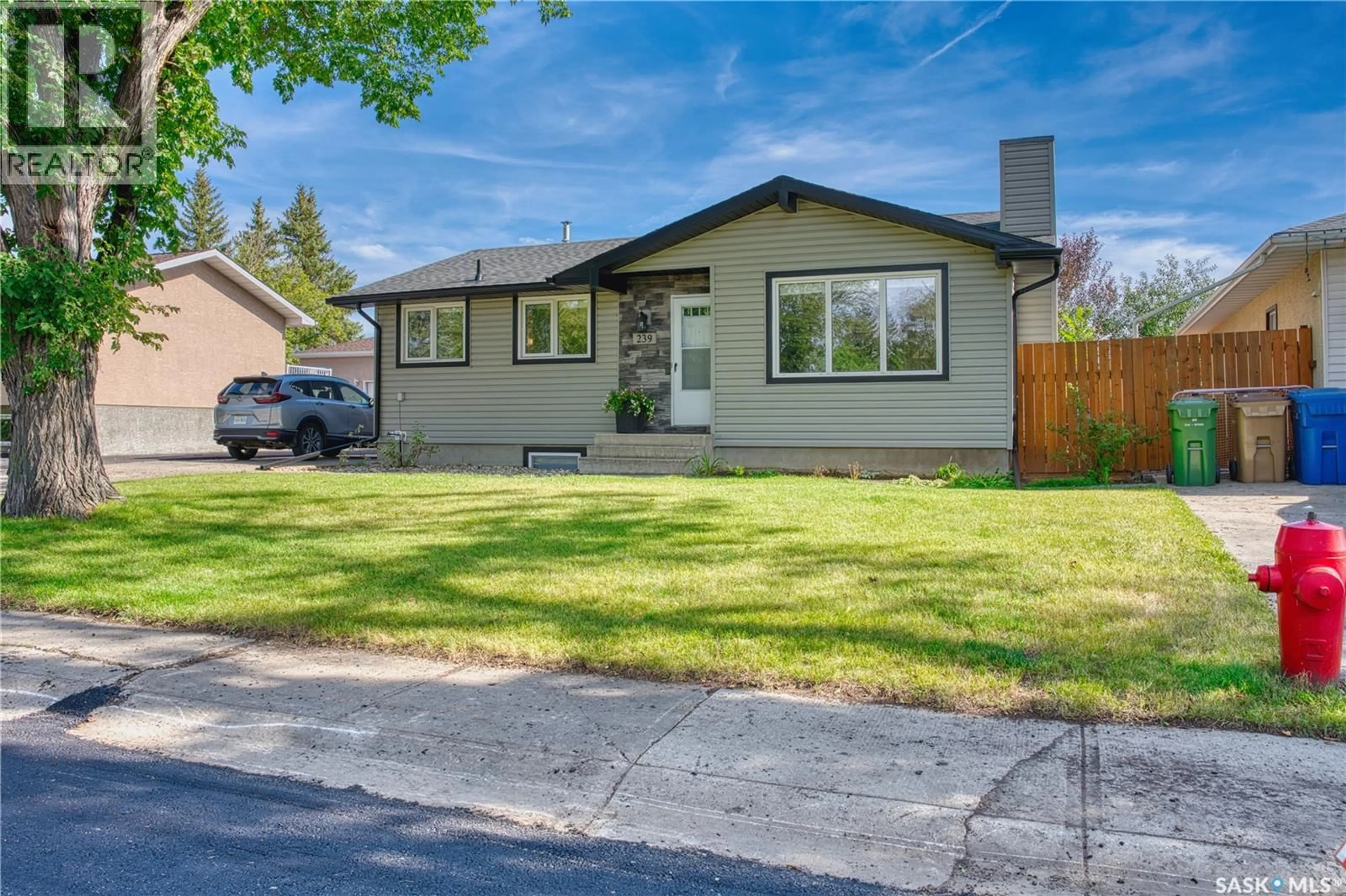 Home with vinyl exterior material, street for 239 RODENBUSH DRIVE, Regina Saskatchewan S4R6X1
