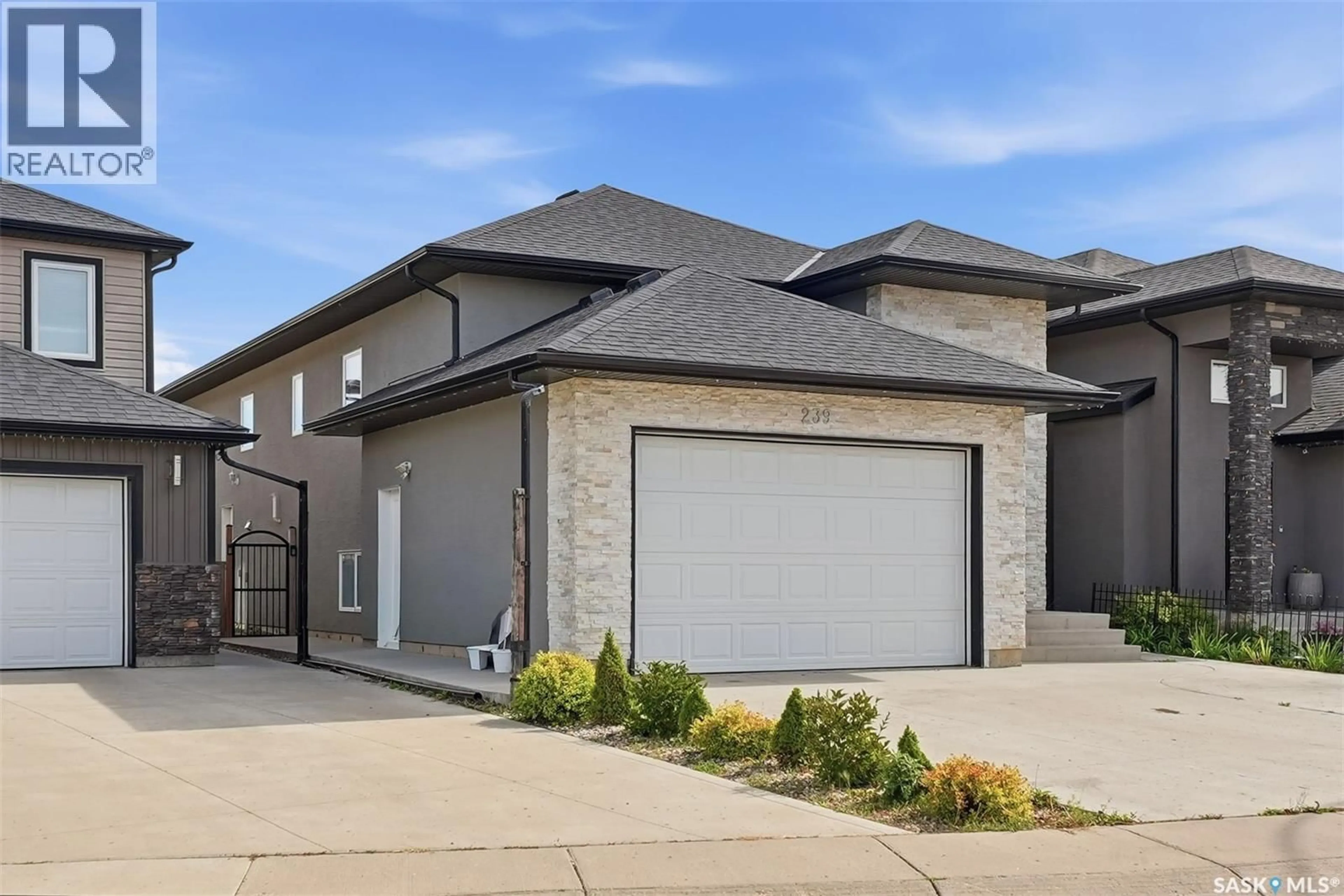 Home with brick exterior material, street for 239 BENTLEY COURT, Saskatoon Saskatchewan S7L6L4