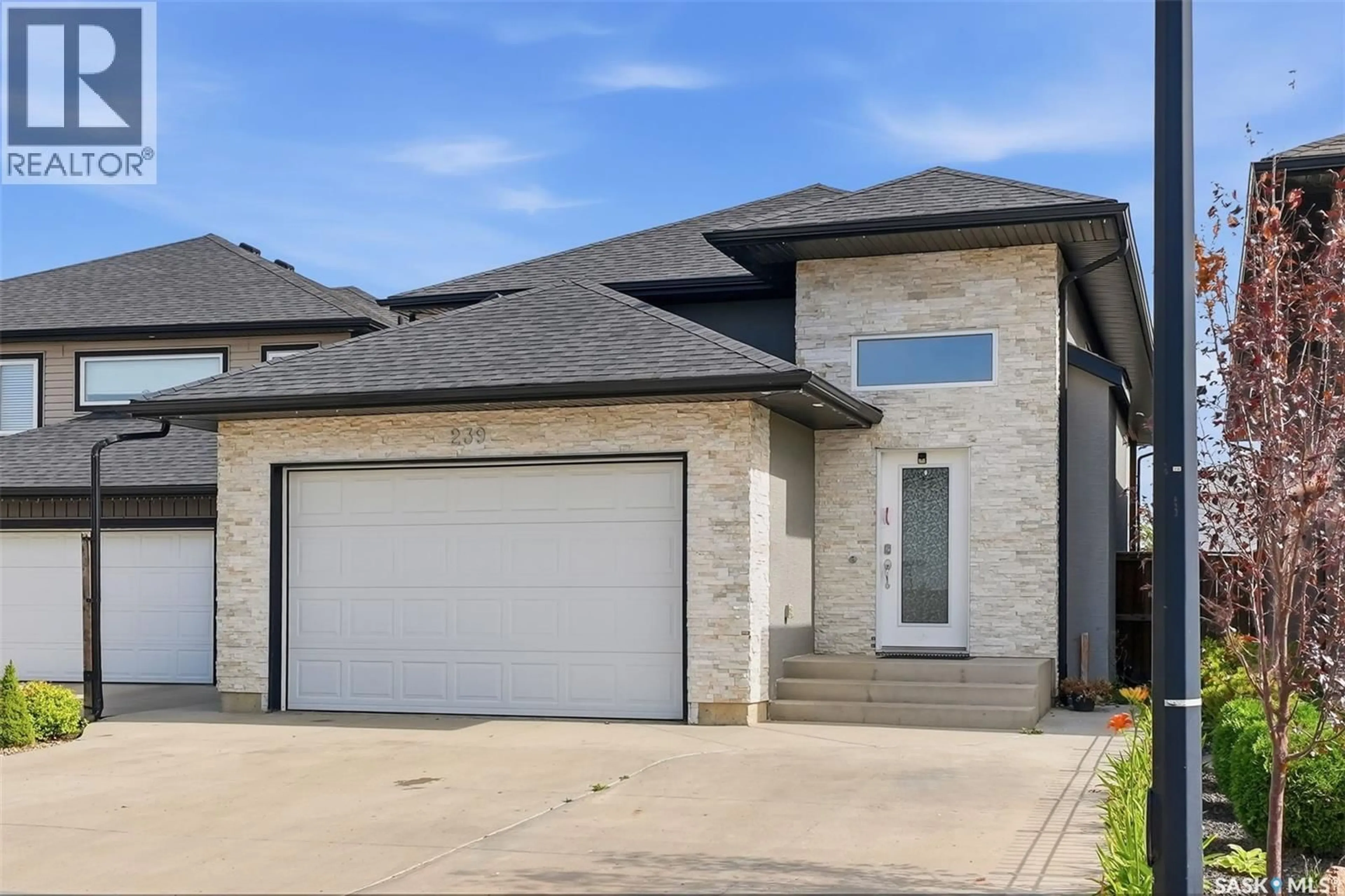 Home with brick exterior material, street for 239 BENTLEY COURT, Saskatoon Saskatchewan S7L6L4