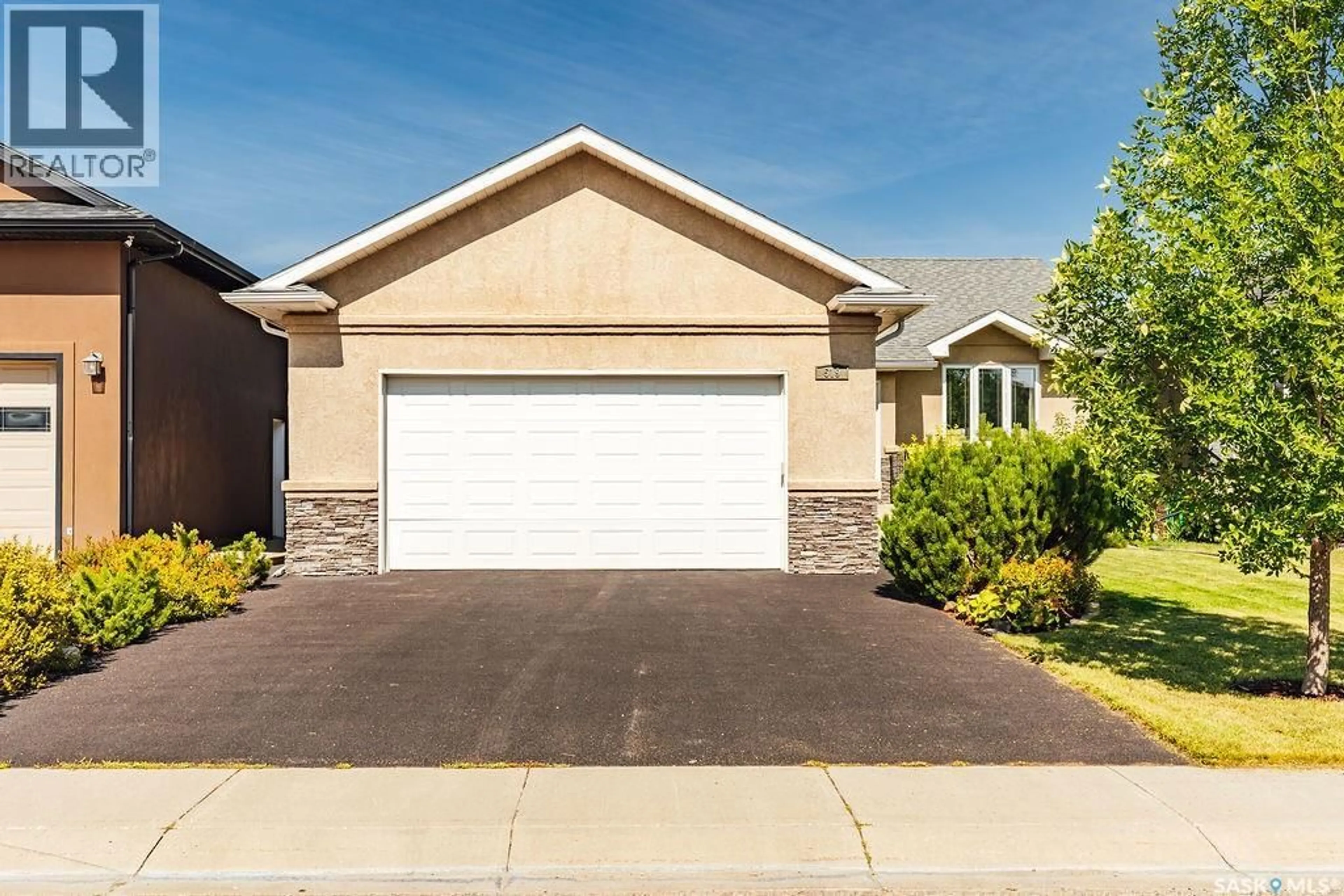Home with vinyl exterior material, street for 519 SHEPHERD CRESCENT, Saskatoon Saskatchewan S7N4K5