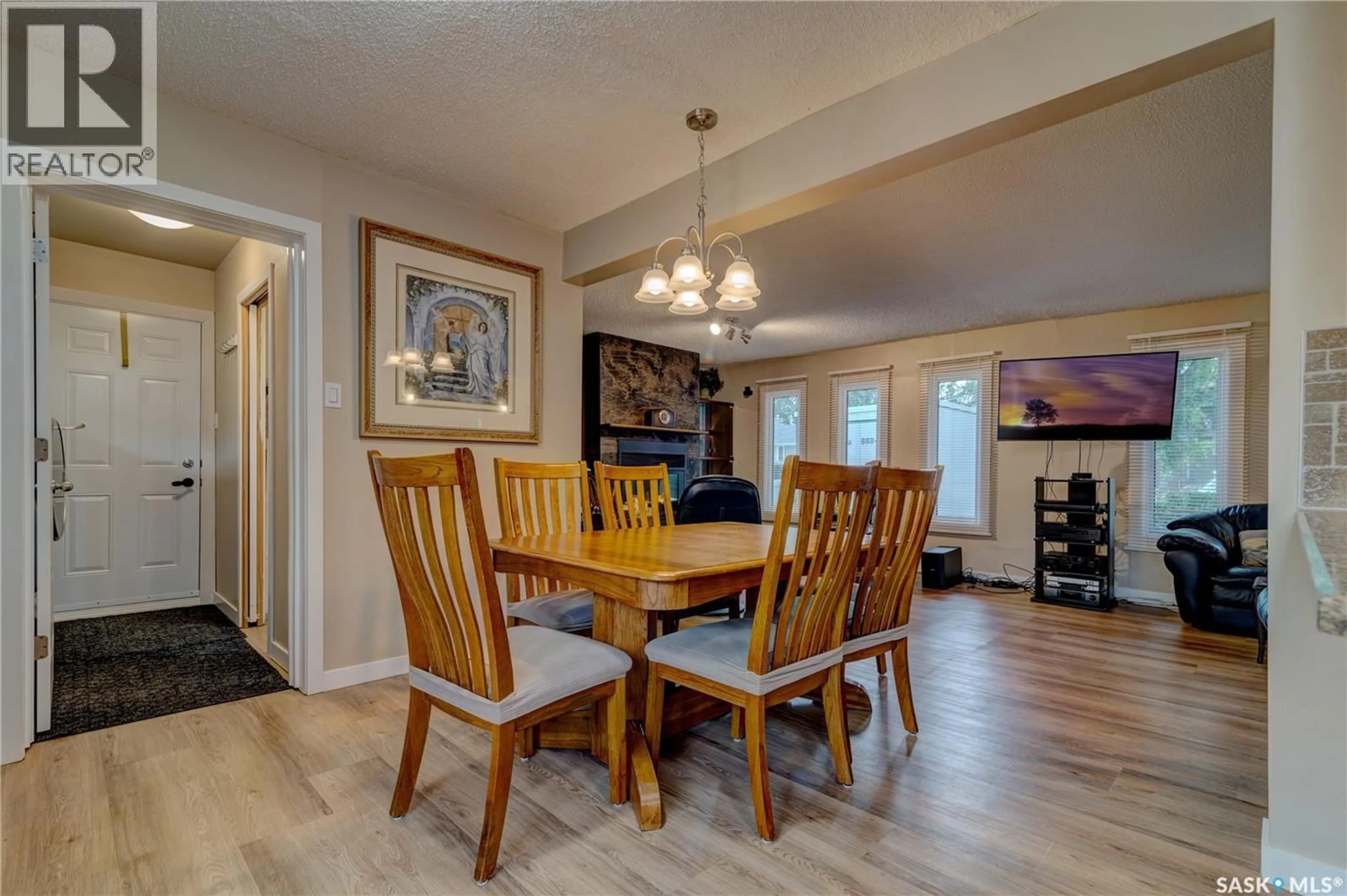 Dining room, wood/laminate floor for 99 COLDWELL ROAD, Regina Saskatchewan S4R4K4