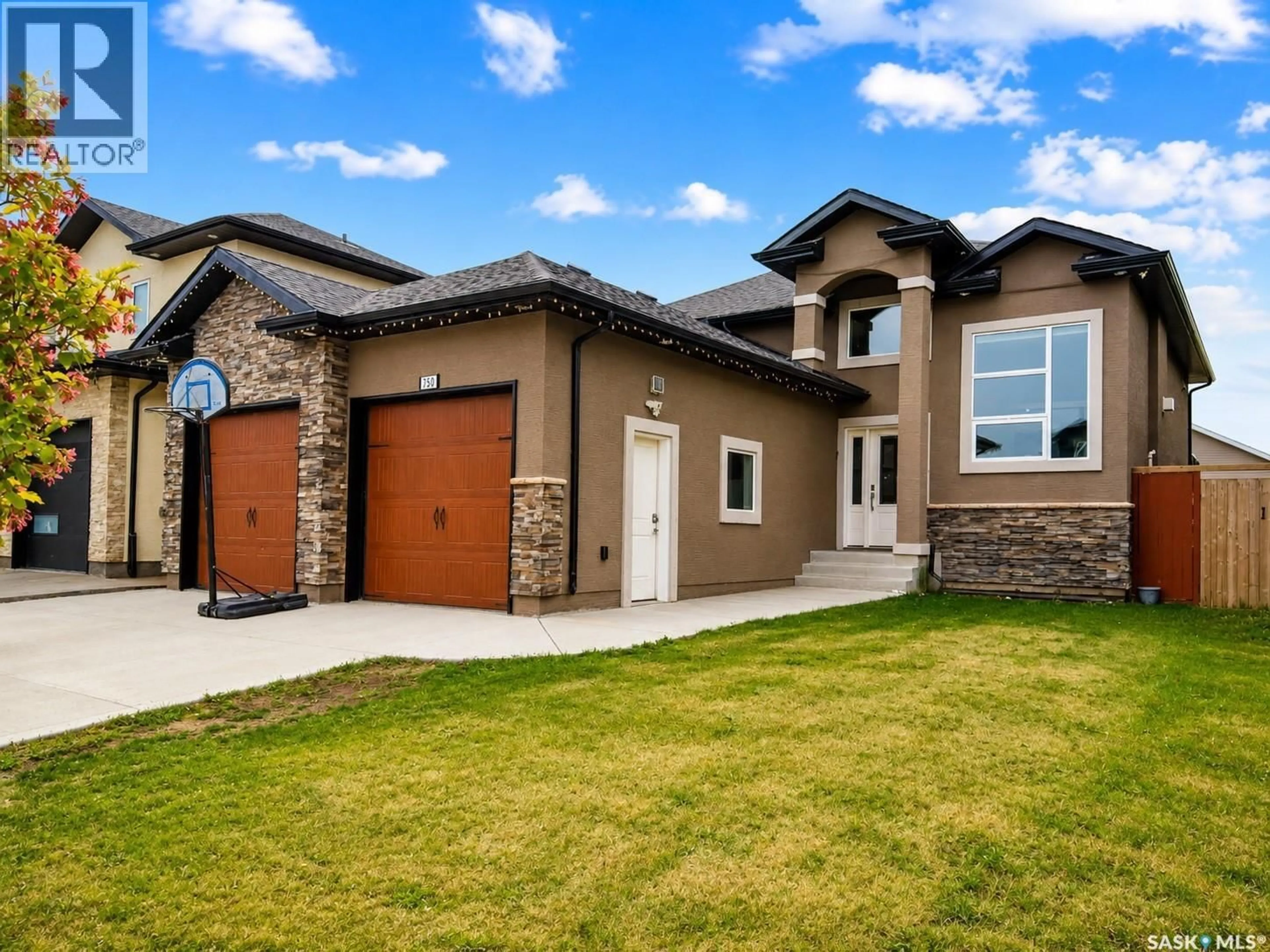 Home with brick exterior material, street for 750 LABINE COURT, Saskatoon Saskatchewan S7L6C8