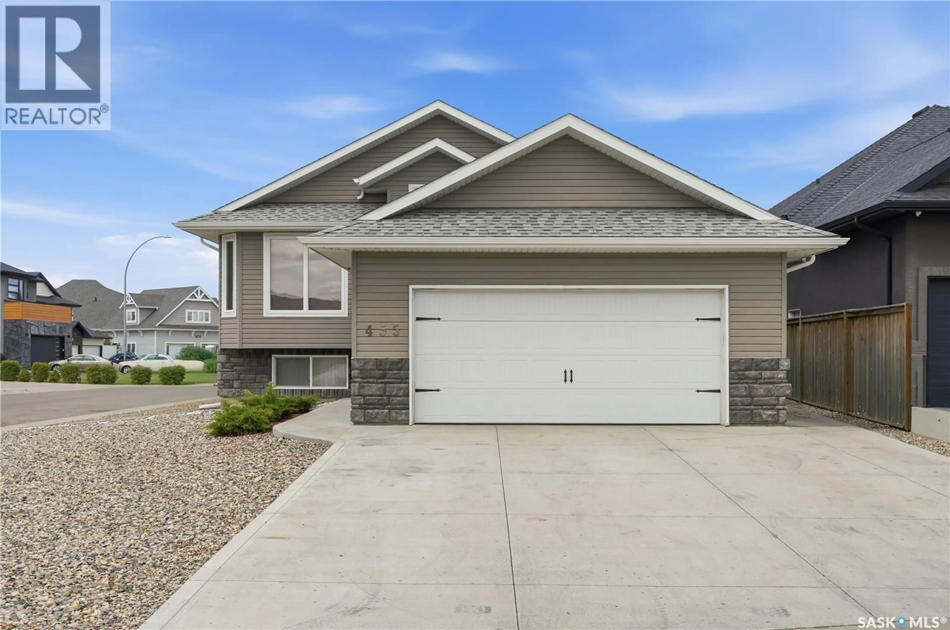 Home with vinyl exterior material, street for 455 HASTINGS CRESCENT, Saskatoon Saskatchewan S7V0C8