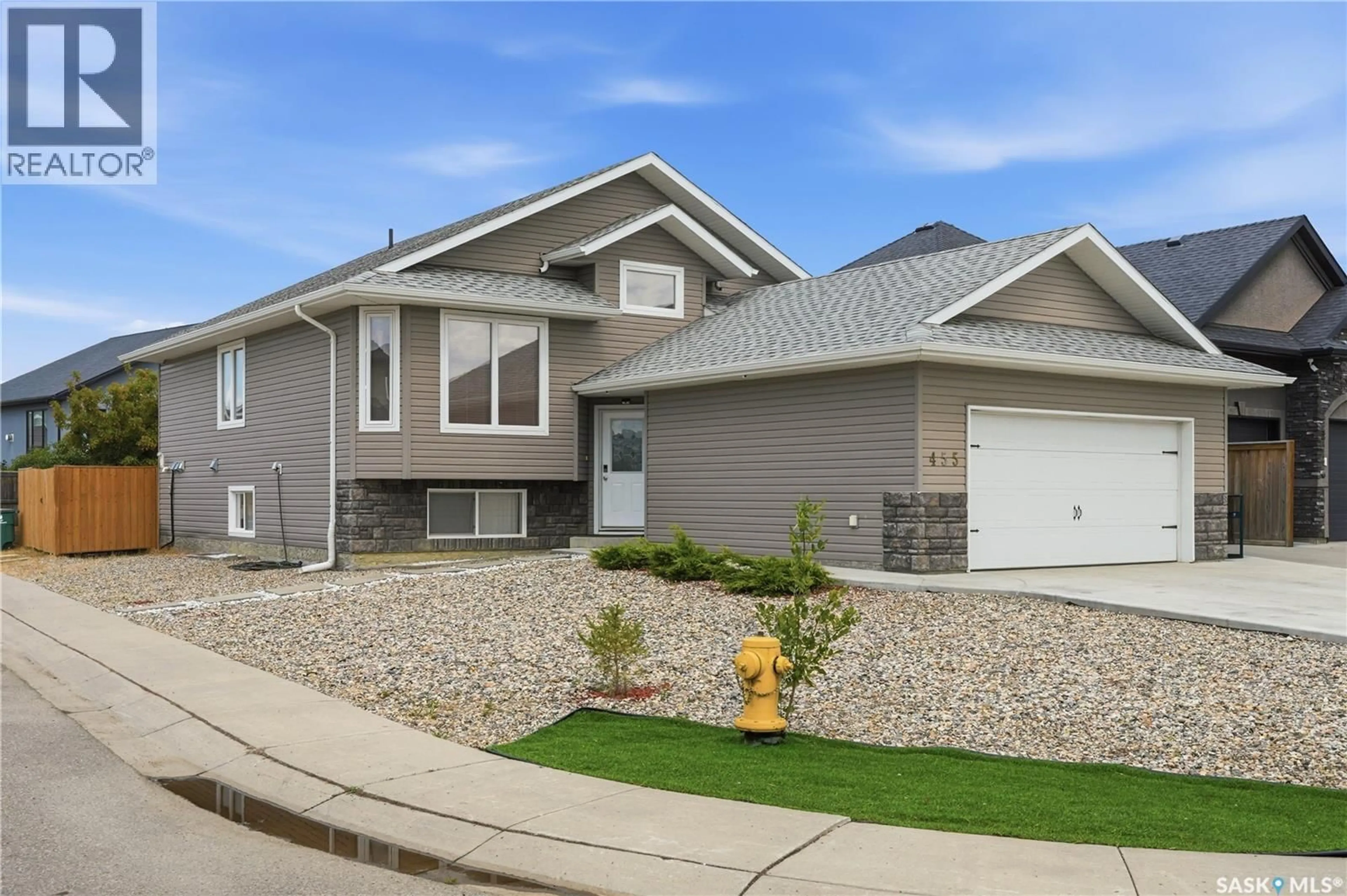 Home with vinyl exterior material, street for 455 HASTINGS CRESCENT, Saskatoon Saskatchewan S7V0C8