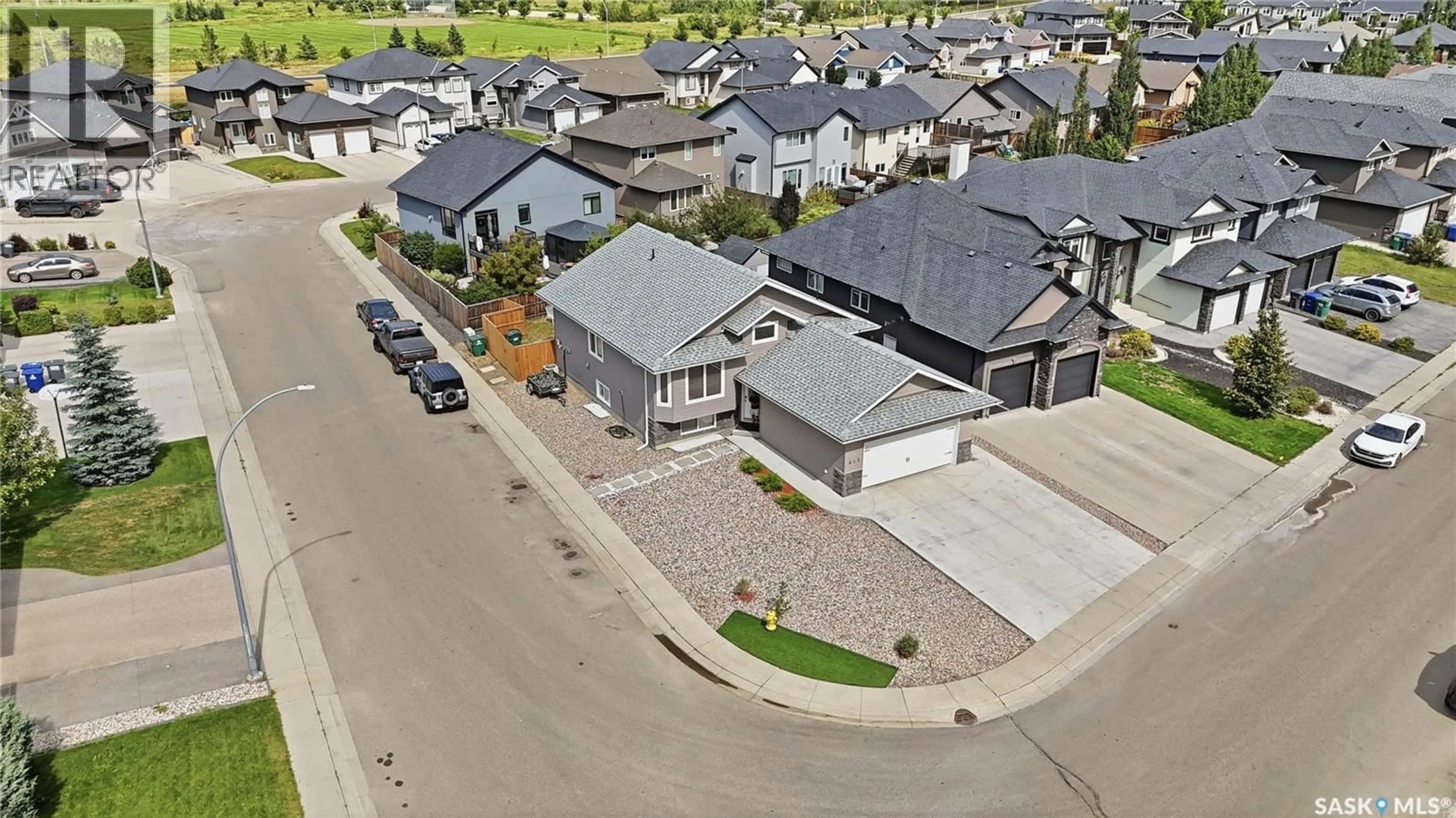 A pic from outside/outdoor area/front of a property/back of a property/a pic from drone, street for 455 HASTINGS CRESCENT, Saskatoon Saskatchewan S7V0C8