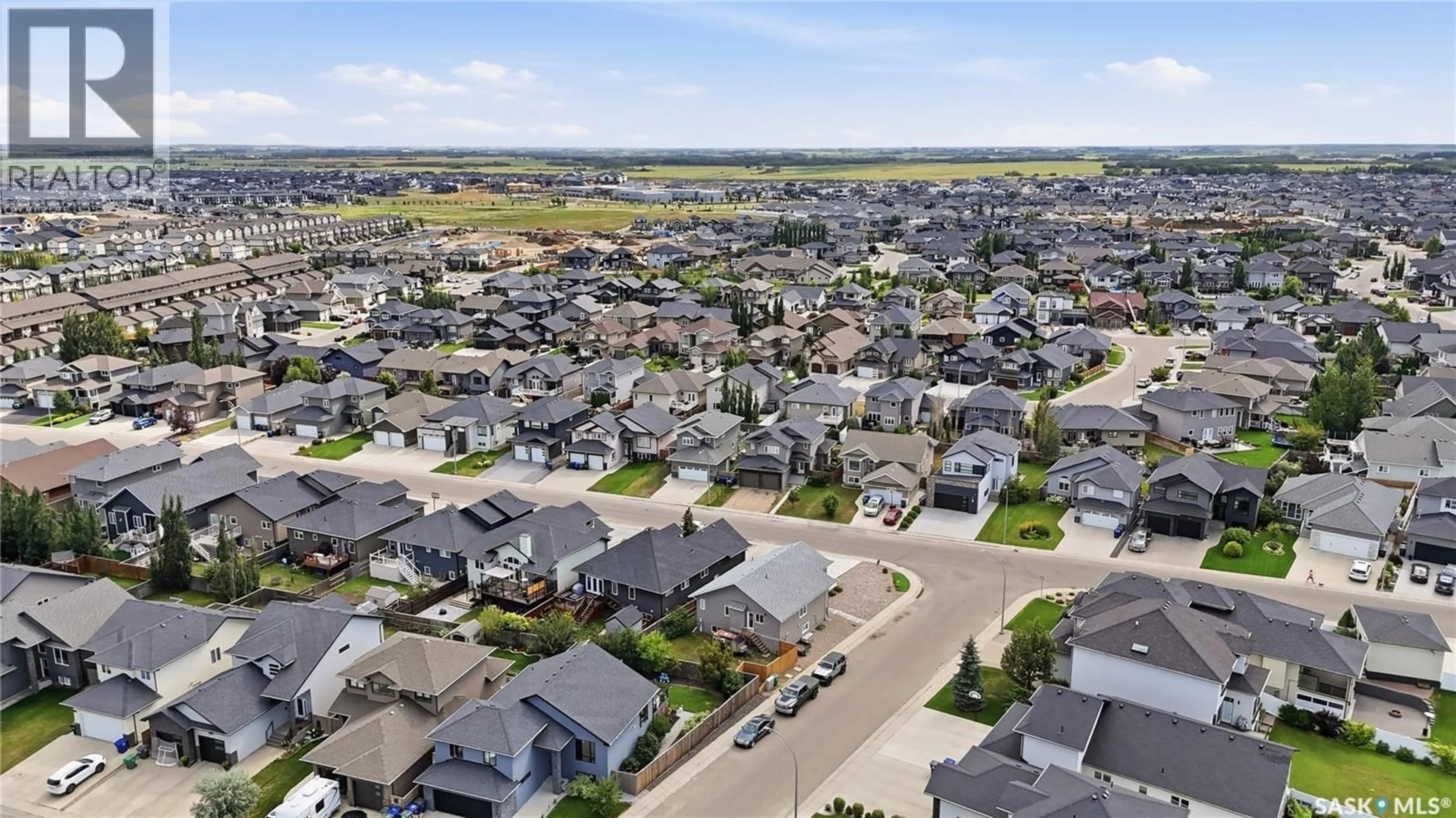 A pic from outside/outdoor area/front of a property/back of a property/a pic from drone, street for 455 HASTINGS CRESCENT, Saskatoon Saskatchewan S7V0C8