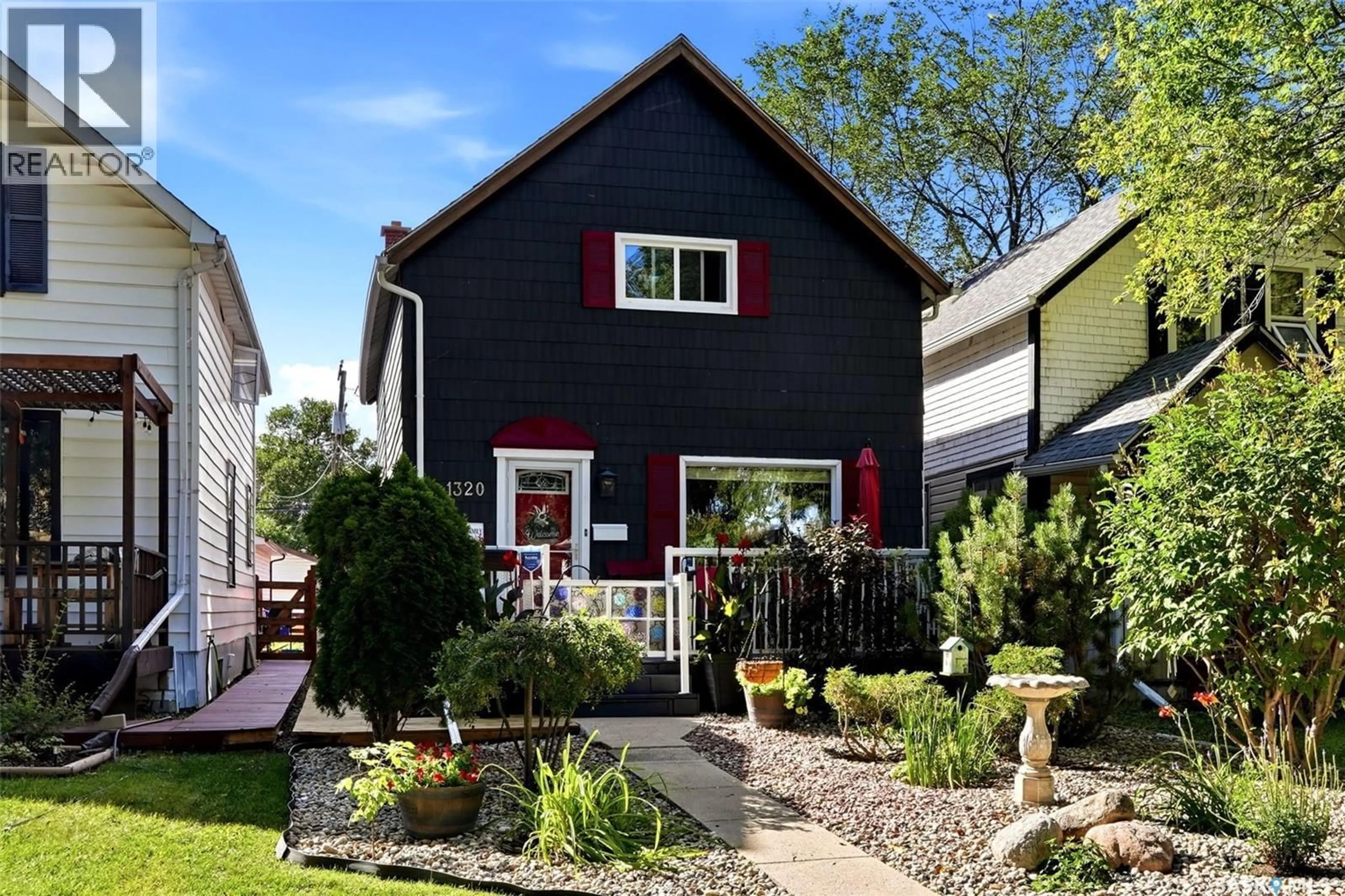 Home with vinyl exterior material, street for 1320 PRINCESS STREET, Regina Saskatchewan S4T3Y8