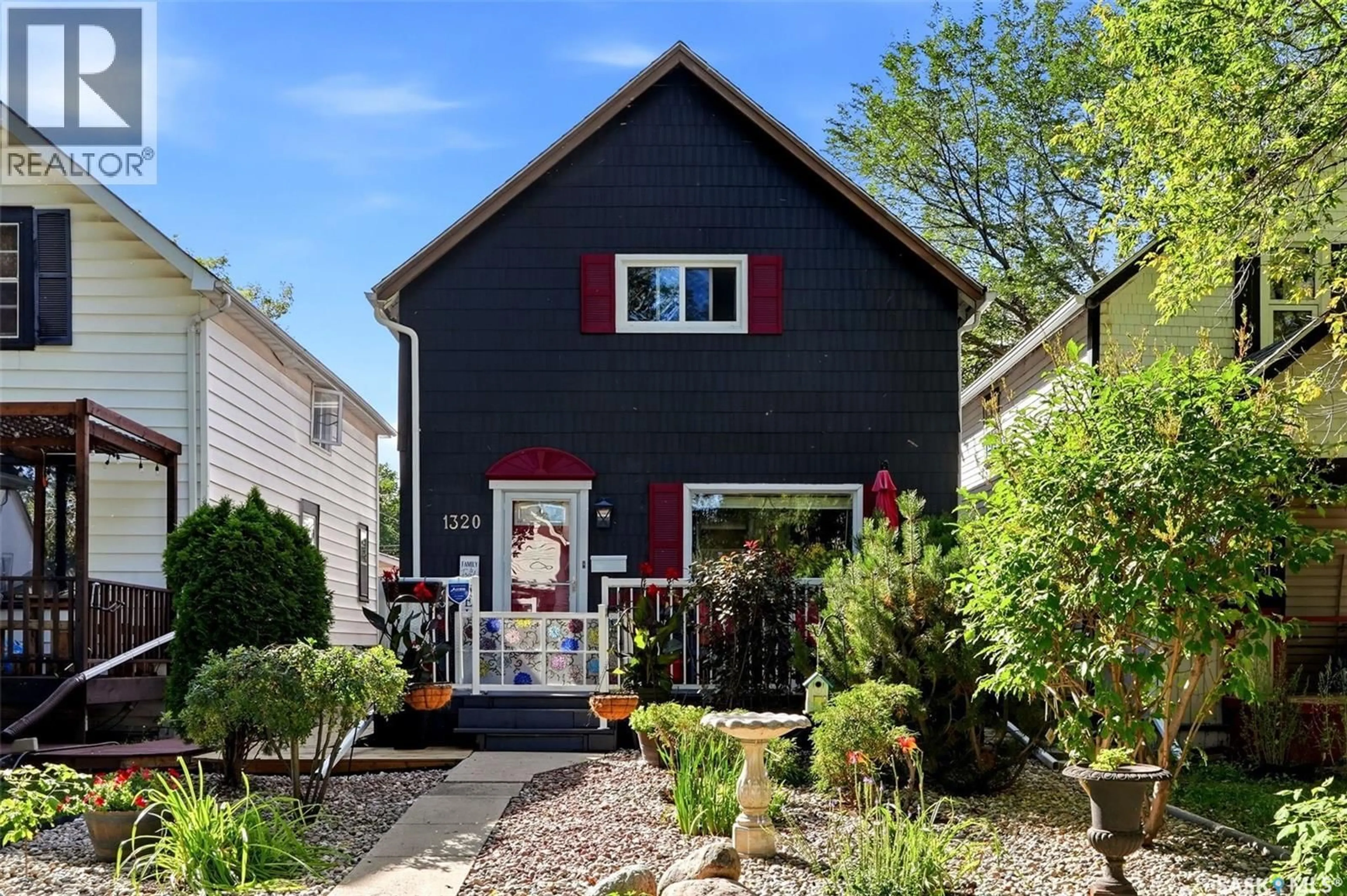 Home with vinyl exterior material, street for 1320 PRINCESS STREET, Regina Saskatchewan S4T3Y8
