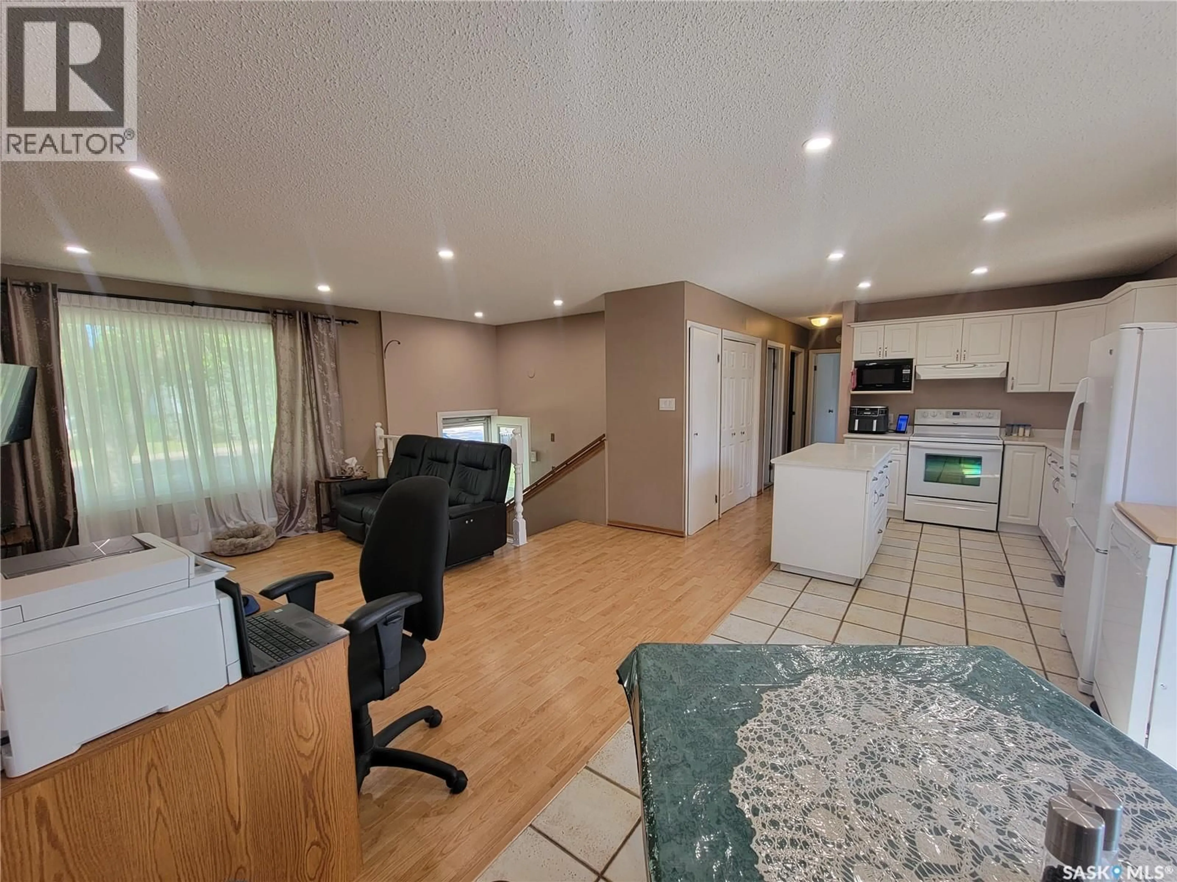 Open concept kitchen, unknown for 2212 95TH STREET, North Battleford Saskatchewan S9A3K5